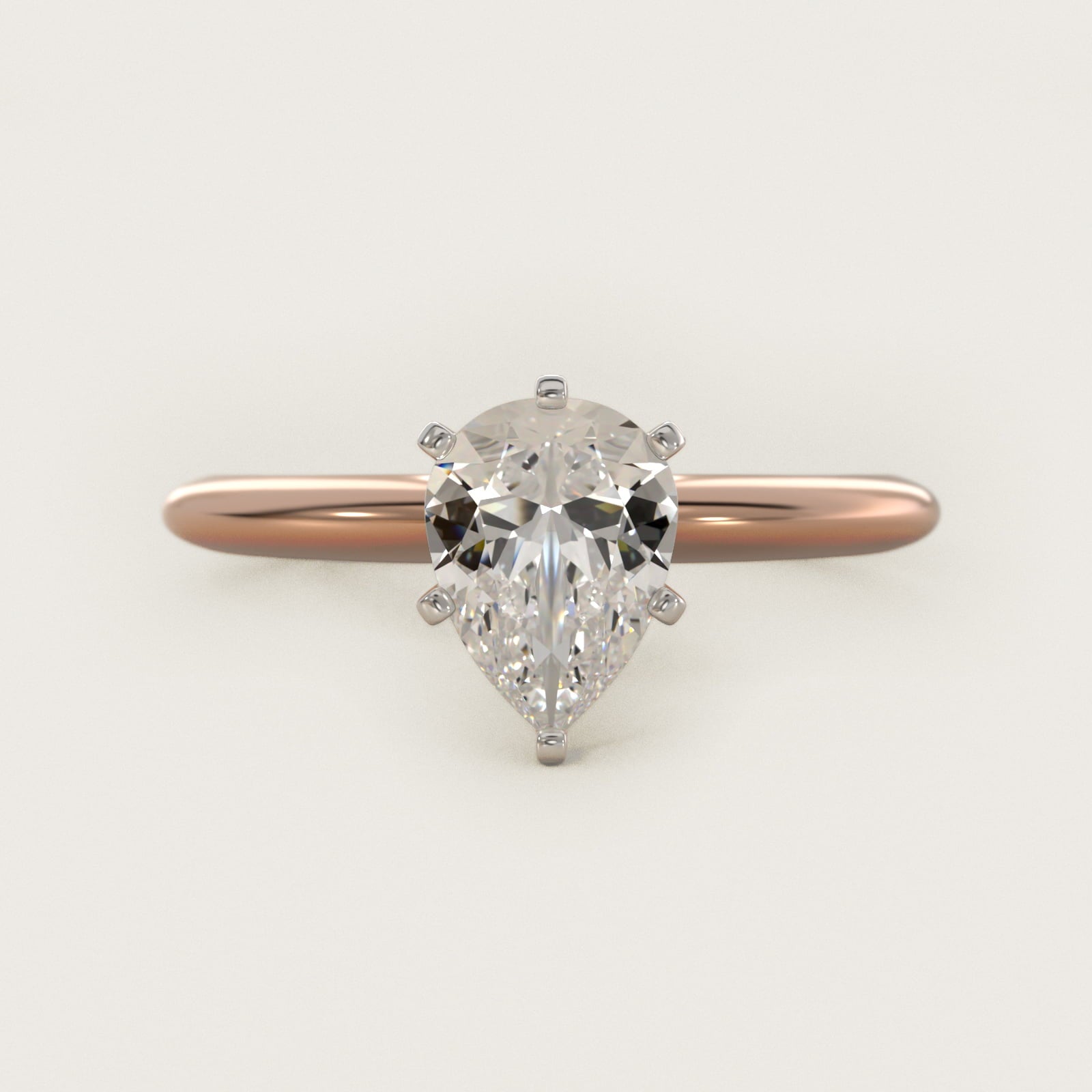 Classic Four Prong Solitaire Engagement Ring in 18k Rose Gold - Pear Center