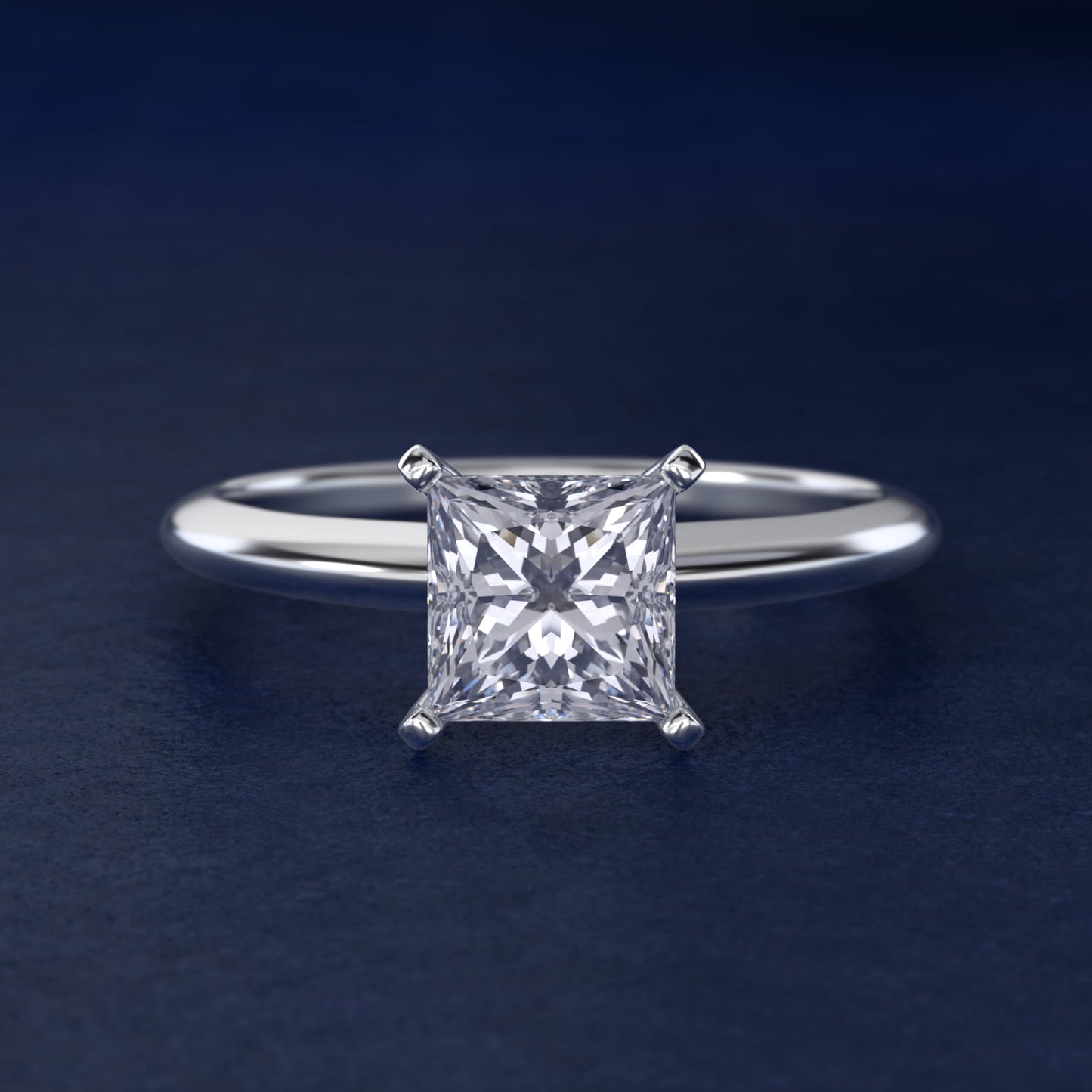 Classic Four Prong Solitaire Engagement Ring in Platinum - Princess Center