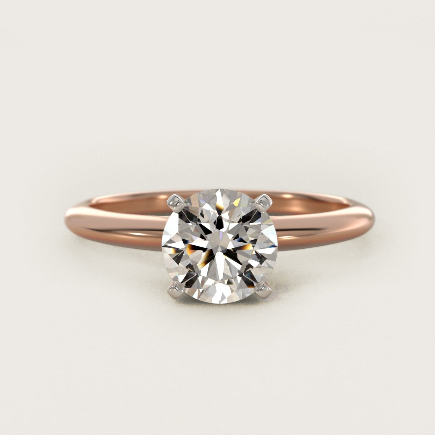 Classic Four Prong Solitaire Engagement Ring in 14K Rose Gold - Round Center
