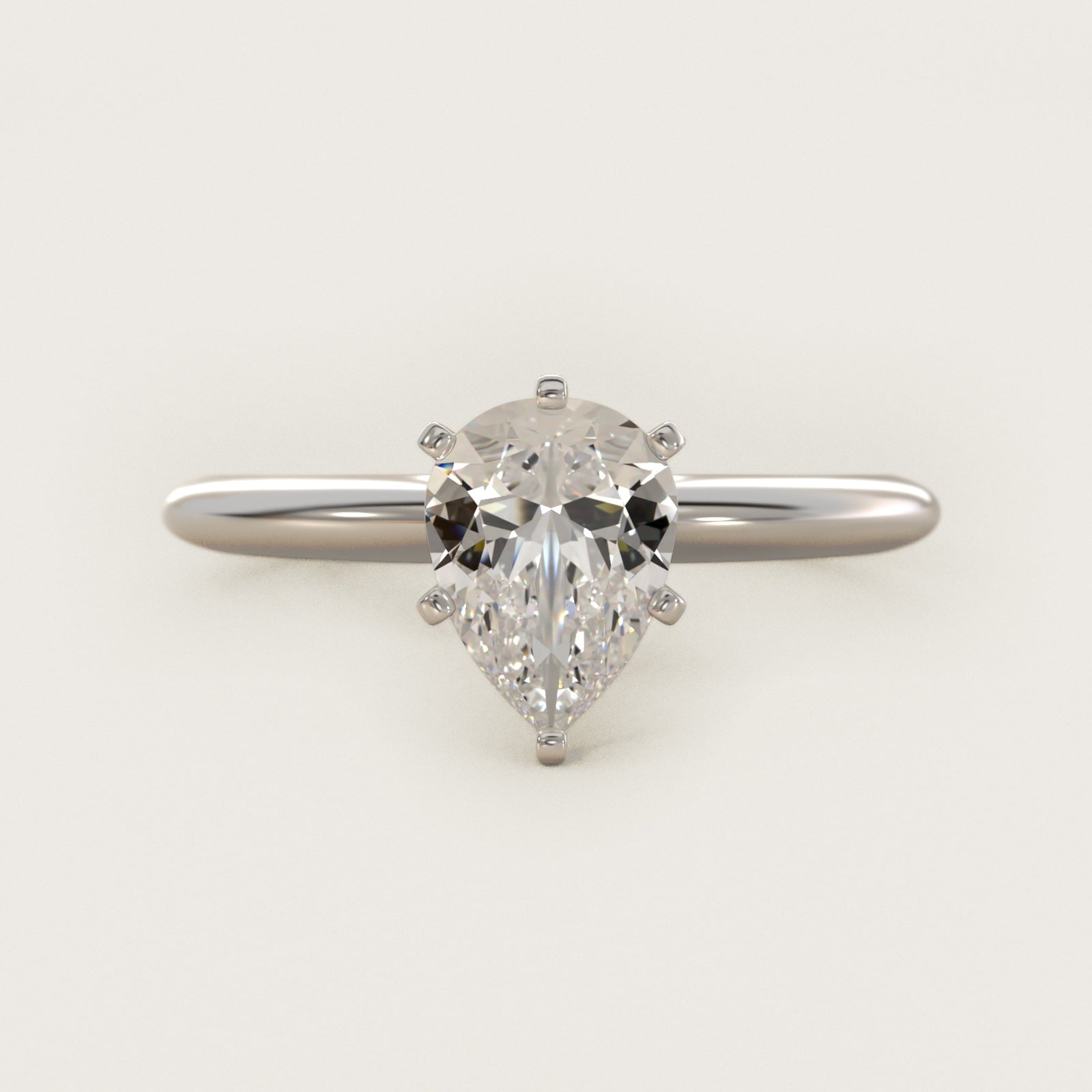 Classic Four-Prong Solitaire Engagement Ring in 18k White Gold - Pear Center