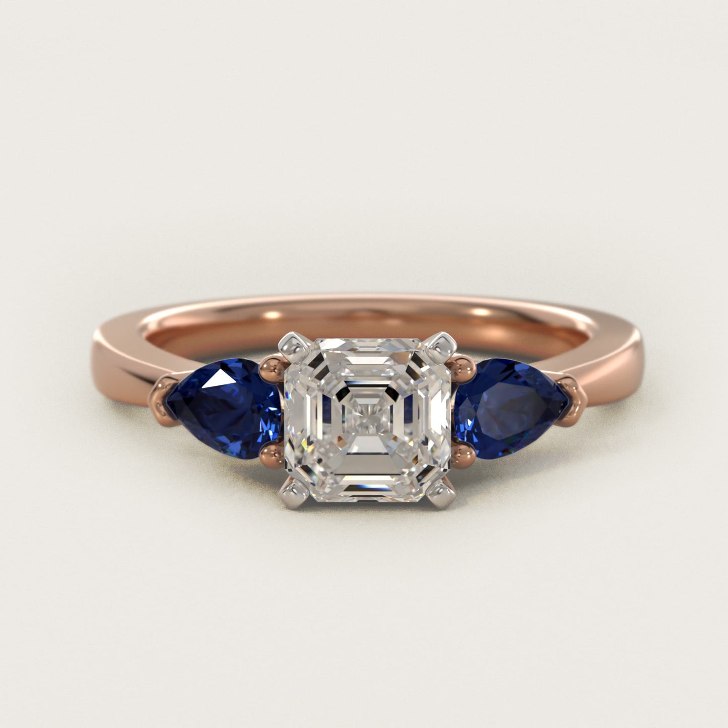 Classic Pear Shaped Sapphire Engagement Ring in 14k Rose Gold - Asscher Center