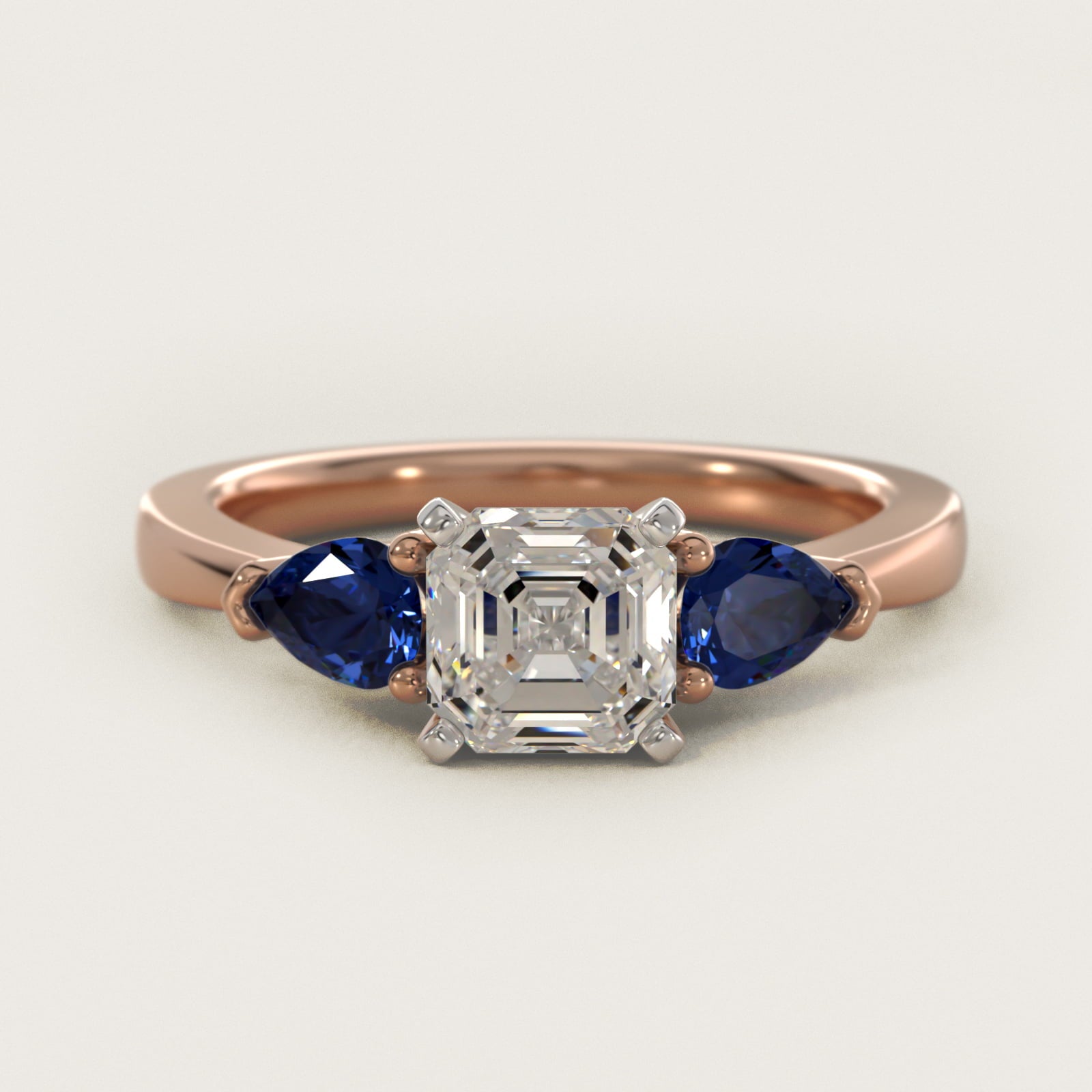 Classic Pear Shaped Sapphire Engagement Ring in 18k Rose Gold - Asscher Center