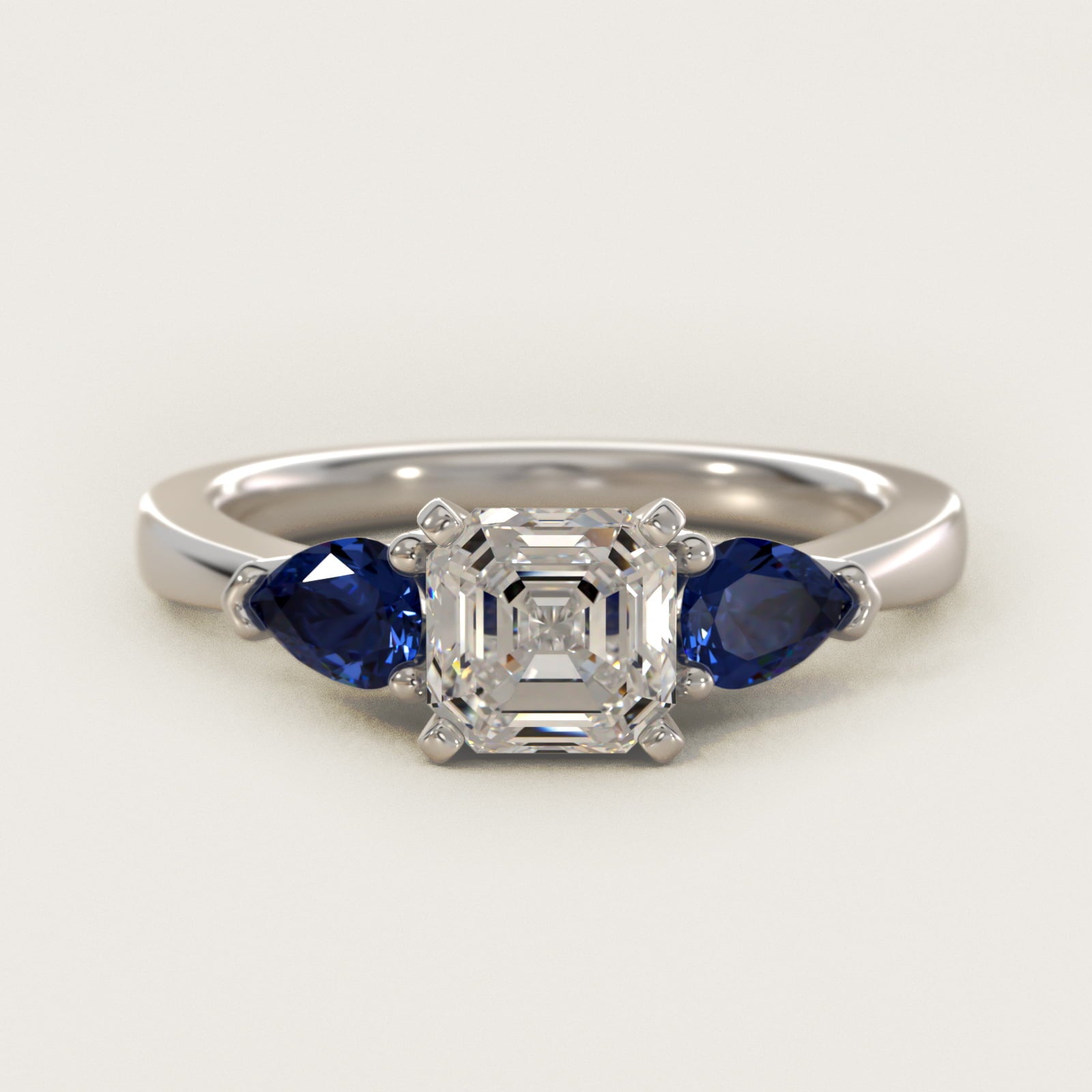 Classic Pear Shaped Sapphire Engagement Ring in 18k White Gold - Asscher Center