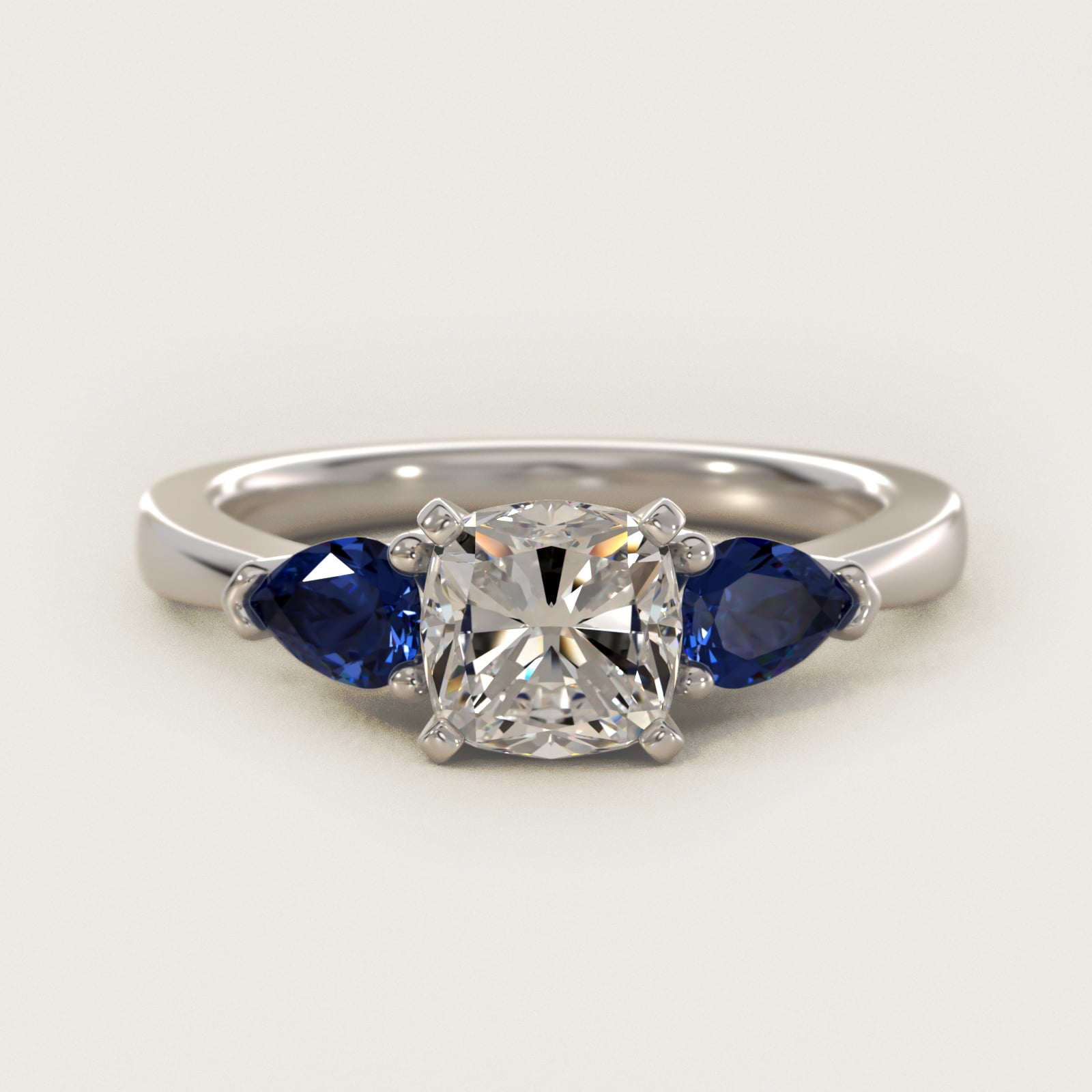 Classic Pear Shaped Sapphire Engagement Ring in 14k White Gold - Cushion Center