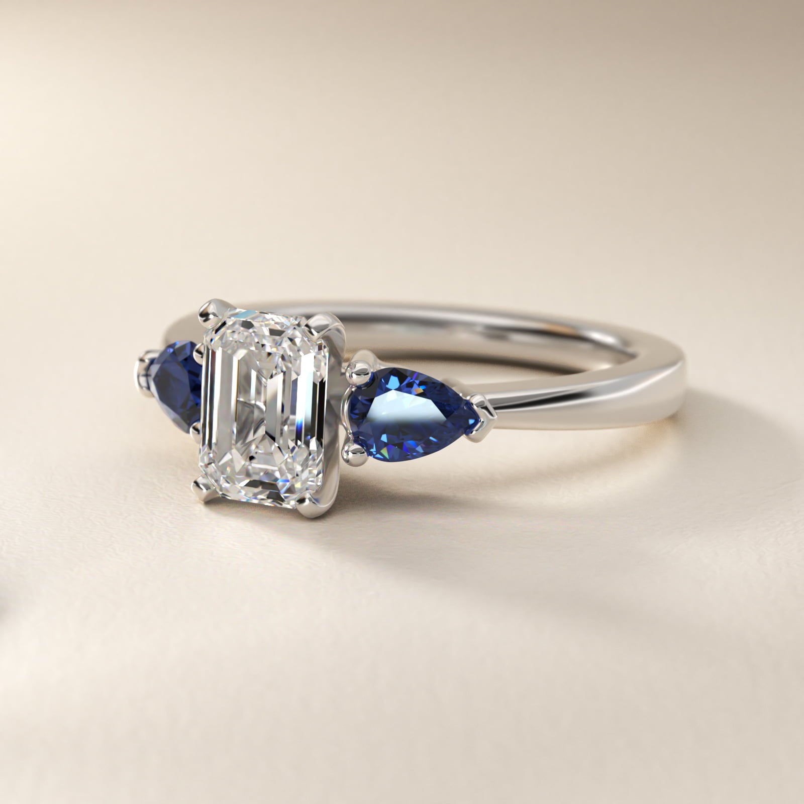 Classic Pear Shaped Sapphire Engagement Ring in Platinum - Emerald Center