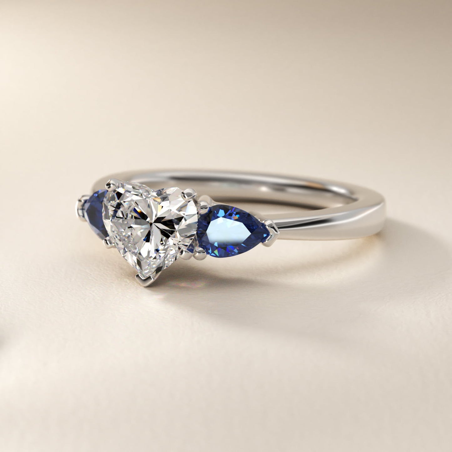 Classic Pear Shaped Sapphire Engagement Ring in Platinum - Heart Center
