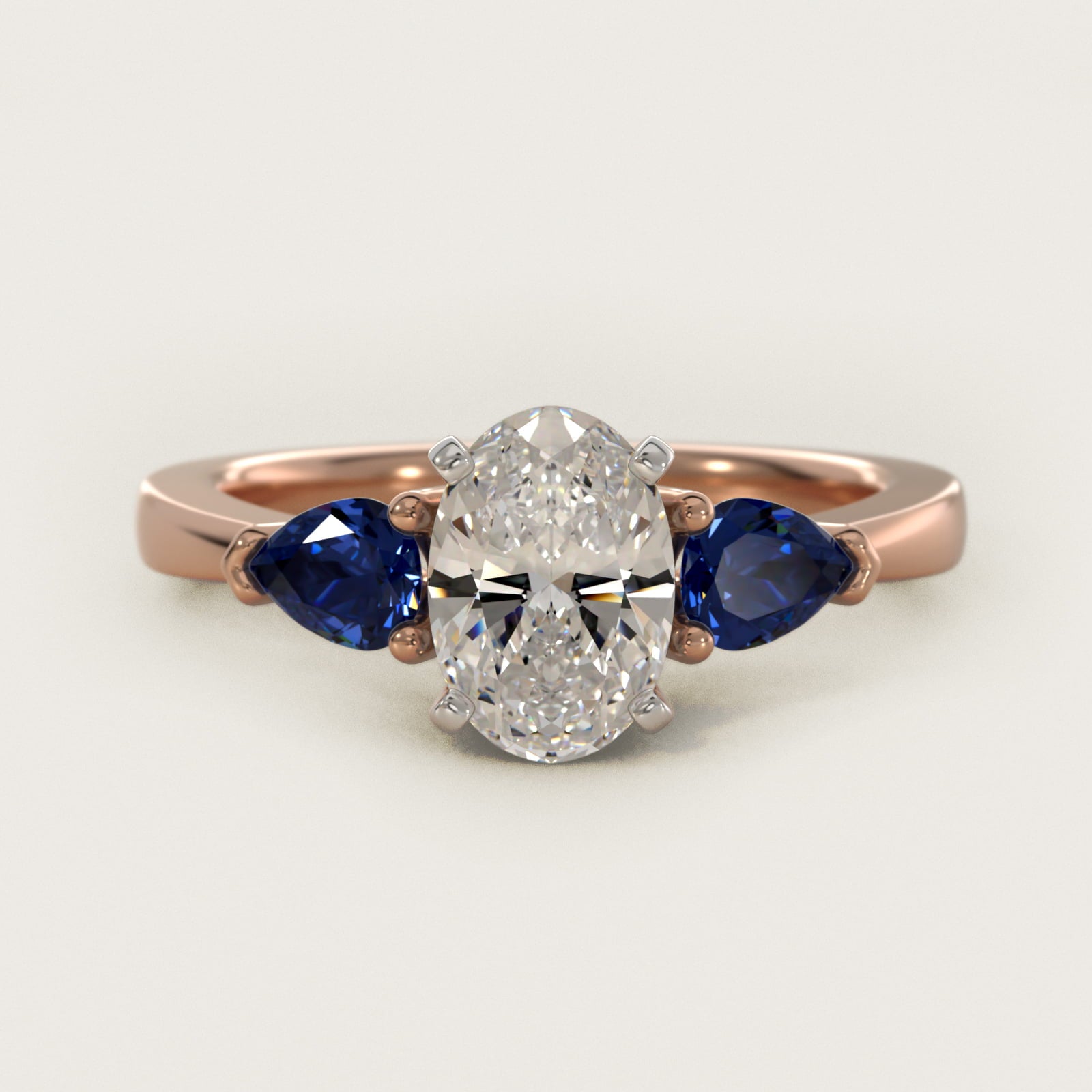 Classic Pear Shaped Sapphire Engagement Ring in 14k Rose Gold - Oval Center