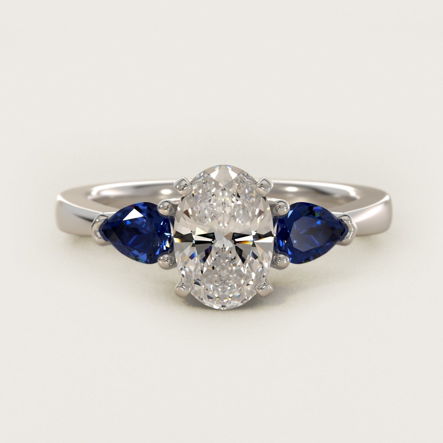 Classic Pear Shaped Sapphire Engagement Ring in 14k White Gold - Oval Center