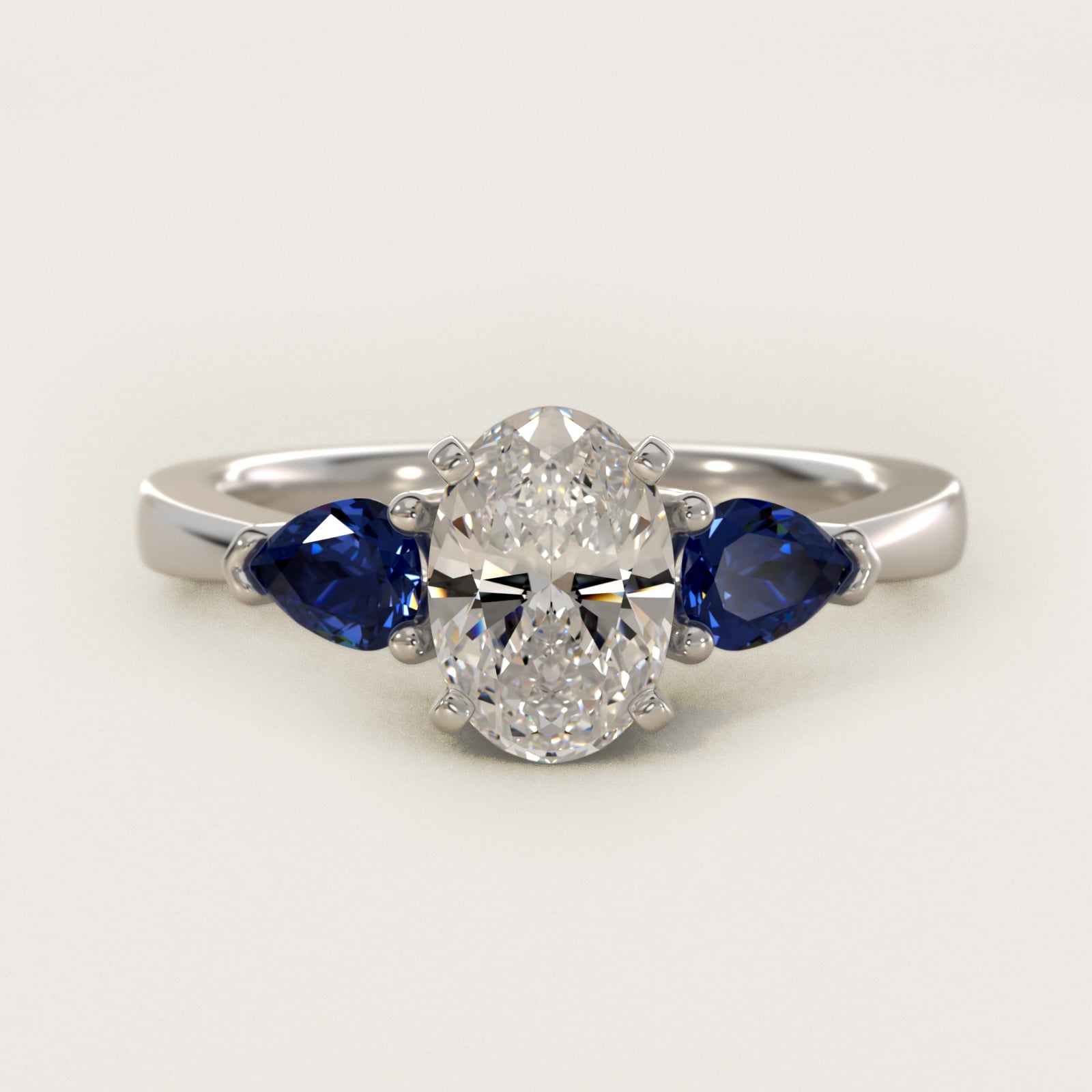 Classic Pear Shaped Sapphire Engagement Ring in 14k White Gold - Oval Center