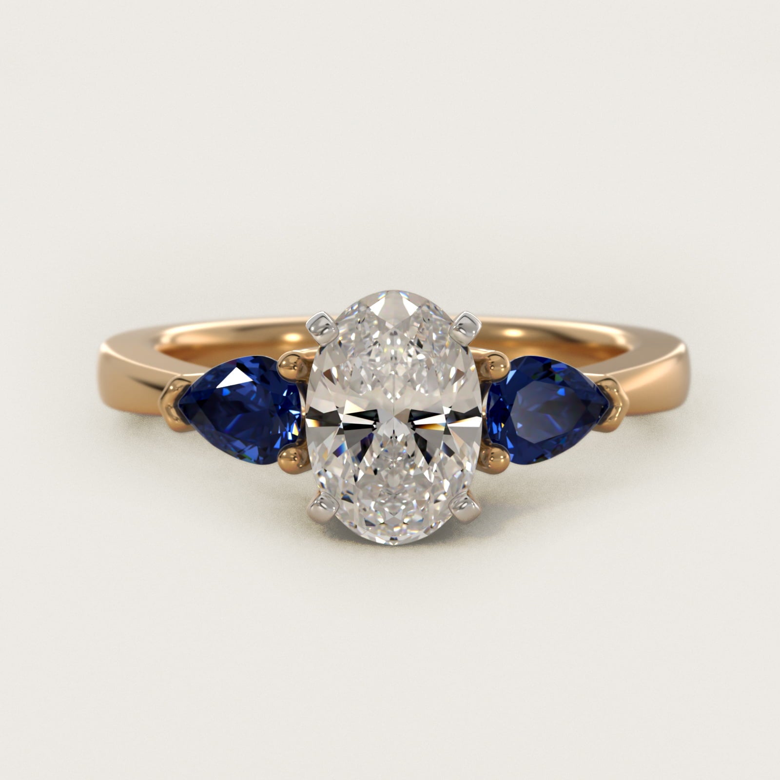 Classic Pear Shaped Sapphire Engagement Ring in 18k Yellow Gold - Oval Center