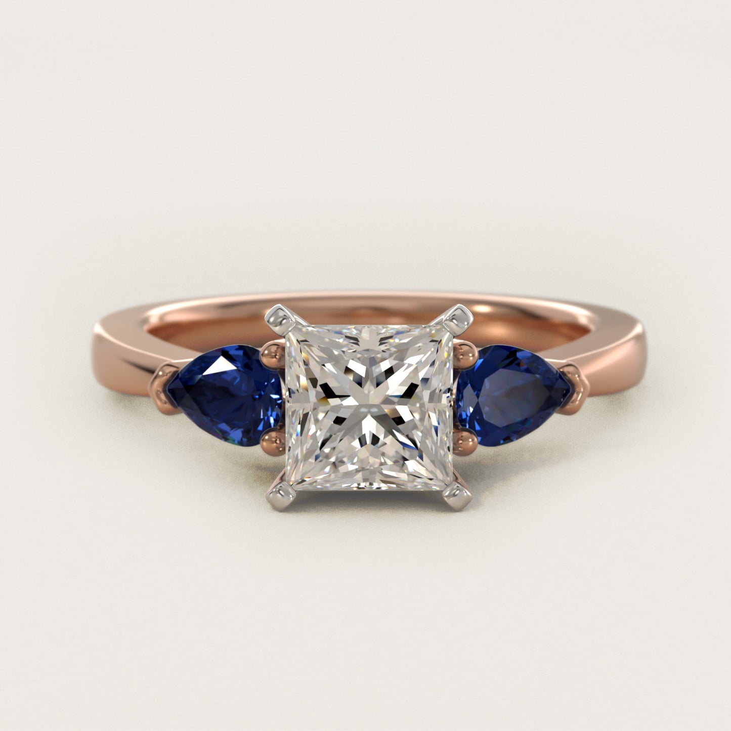 Classic Pear Shaped Sapphire Engagement Ring in 14k Rose Gold - Princess Center
