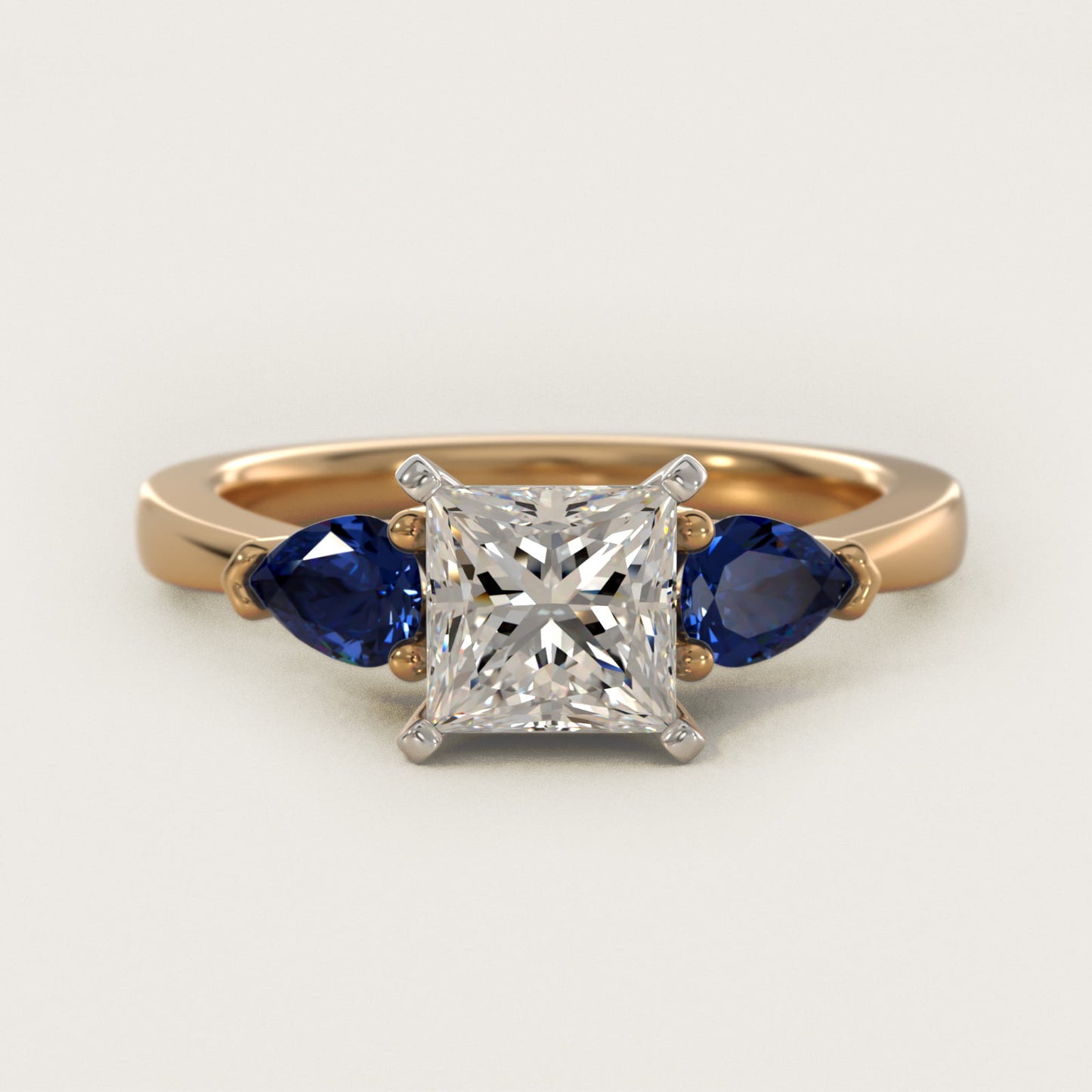 Classic Pear Shaped Sapphire Engagement Ring in 18k Yellow Gold - Princess Center