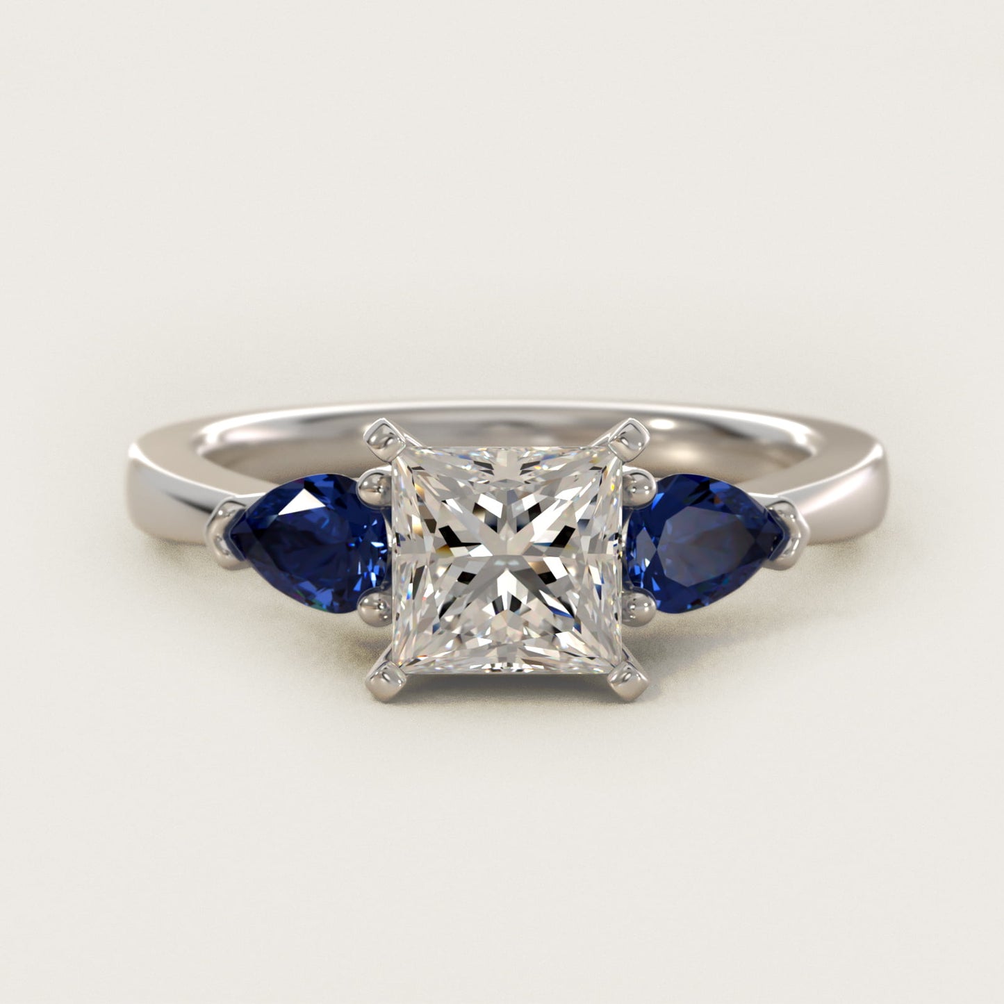 Classic Pear Shaped Sapphire Engagement Ring in Platinum - Princess Center