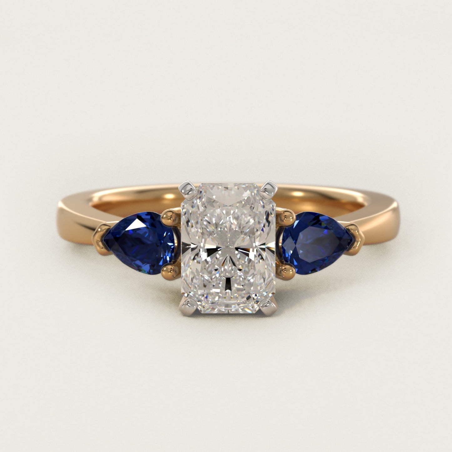 Classic Pear Shaped Sapphire Engagement Ring in 18k Yellow Gold - Radiant Center