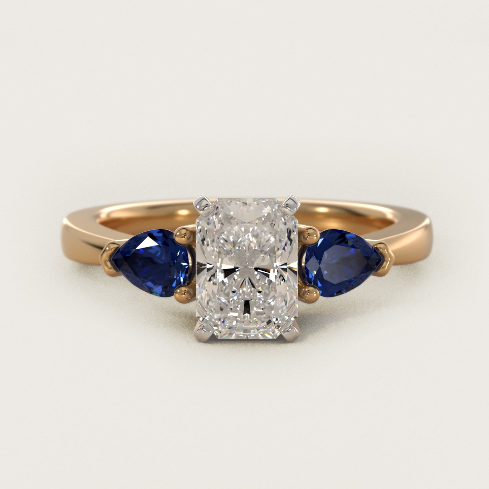 Classic Pear Shaped Sapphire Engagement Ring in 18k Yellow Gold - Radiant Center