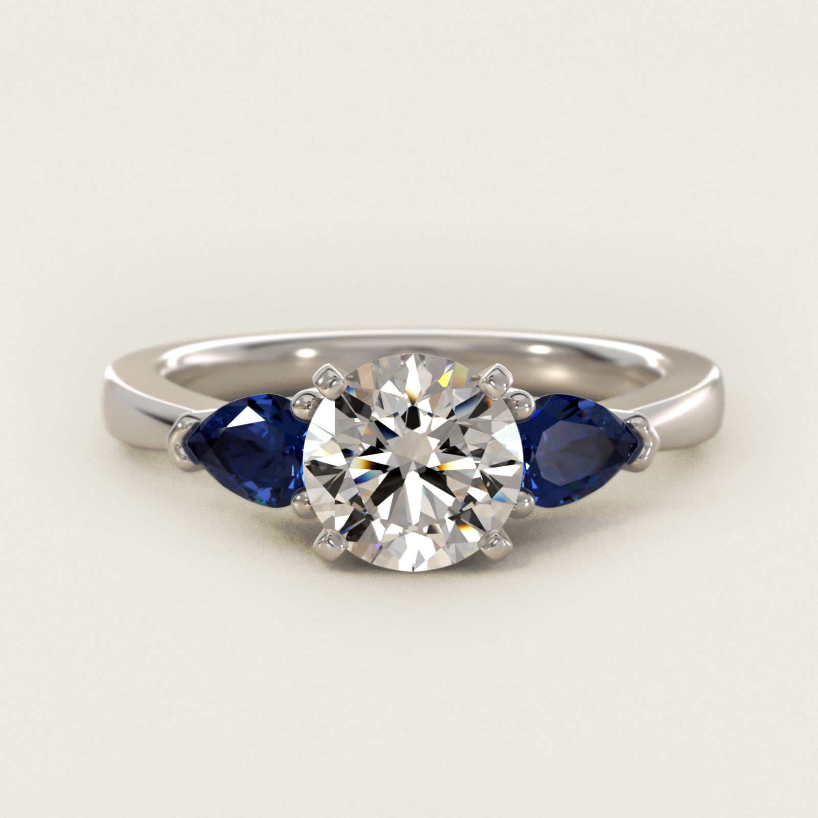 Classic Pear Shaped Sapphire Engagement Ring in 18k White Gold - Round Center