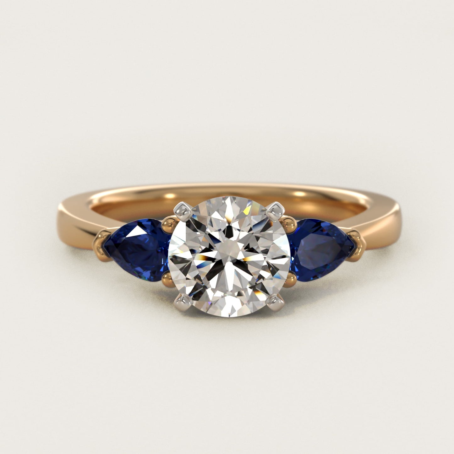 Classic Pear Shaped Sapphire Engagement Ring in 18k Yellow Gold - Round Center