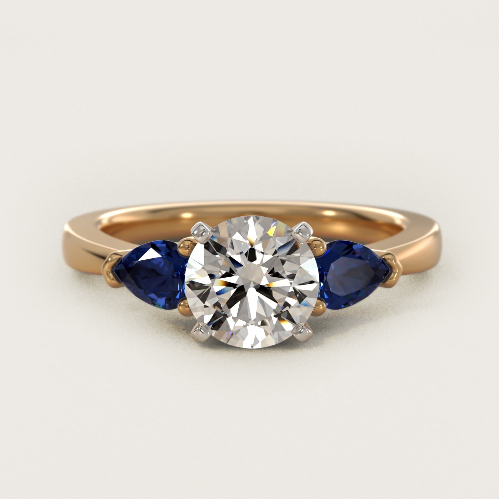 Classic Pear Shaped Sapphire Engagement Ring in 18k Yellow Gold - Round Center