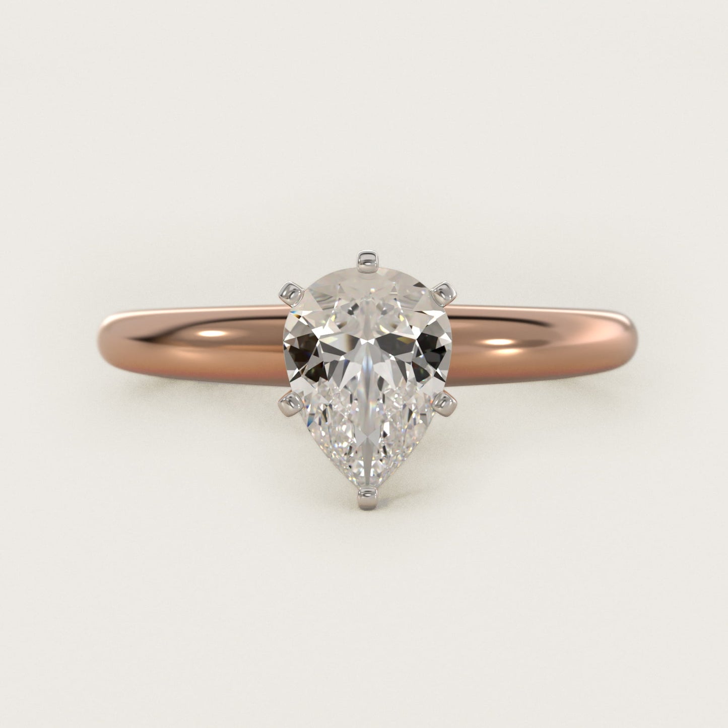 Classic Simple Solitaire Engagement Ring in 14k Rose Gold - Pear Center