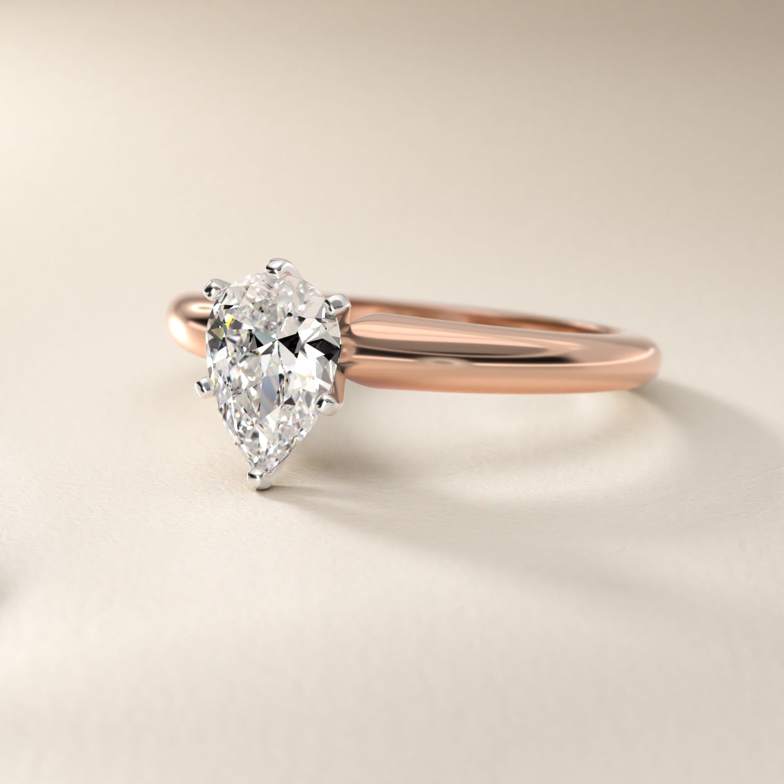 Classic Simple Solitaire Engagement Ring in 14k Rose Gold - Pear Center