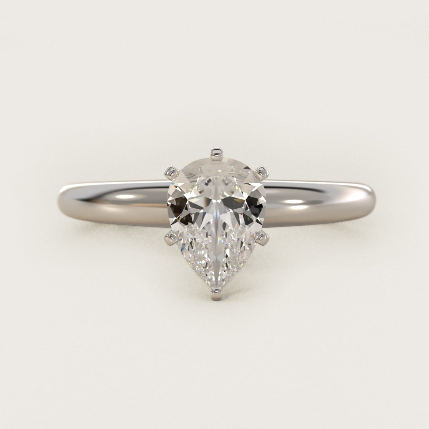 Classic Simple Solitaire Engagement Ring in 18k White Gold - Pear Center