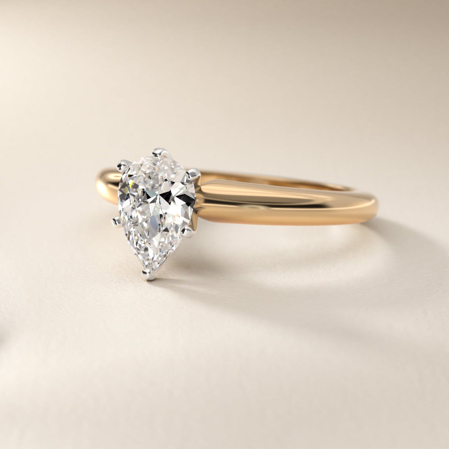Classic Simple Solitaire Engagement Ring in 14K Yellow Gold - Pear Center