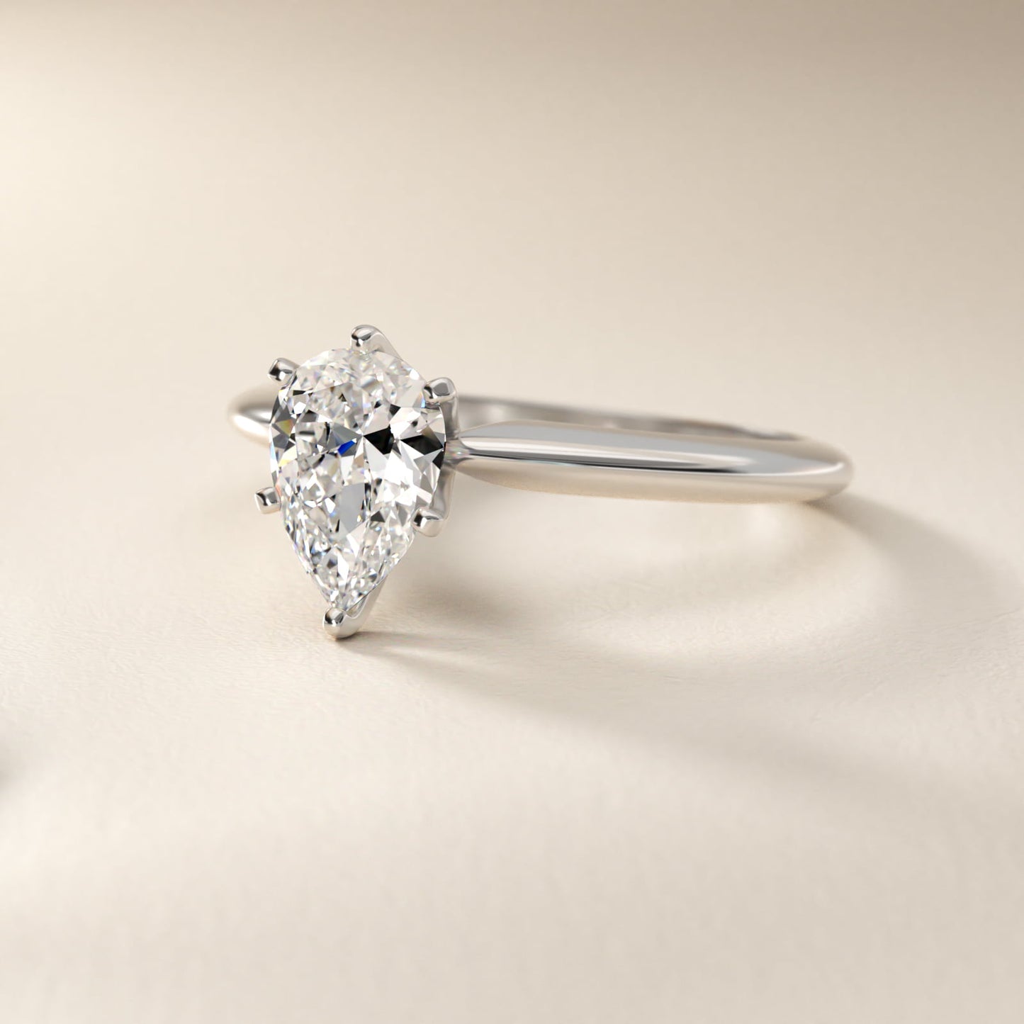 Classic Six-Prong Solitaire Engagement Ring in Platinum - Pear Center