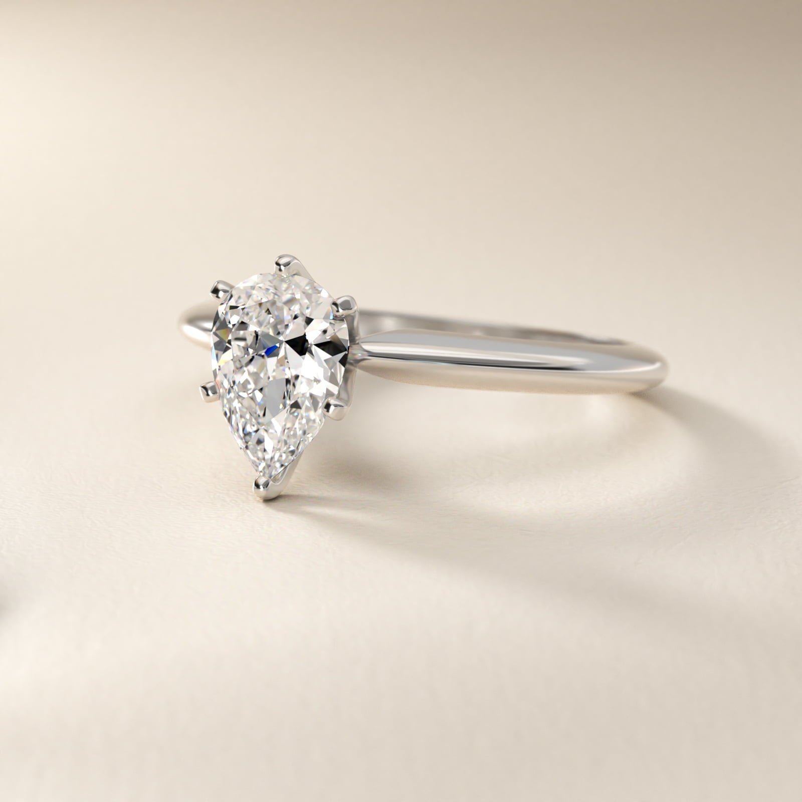 Classic Six-Prong Solitaire Engagement Ring in Platinum - Pear Center