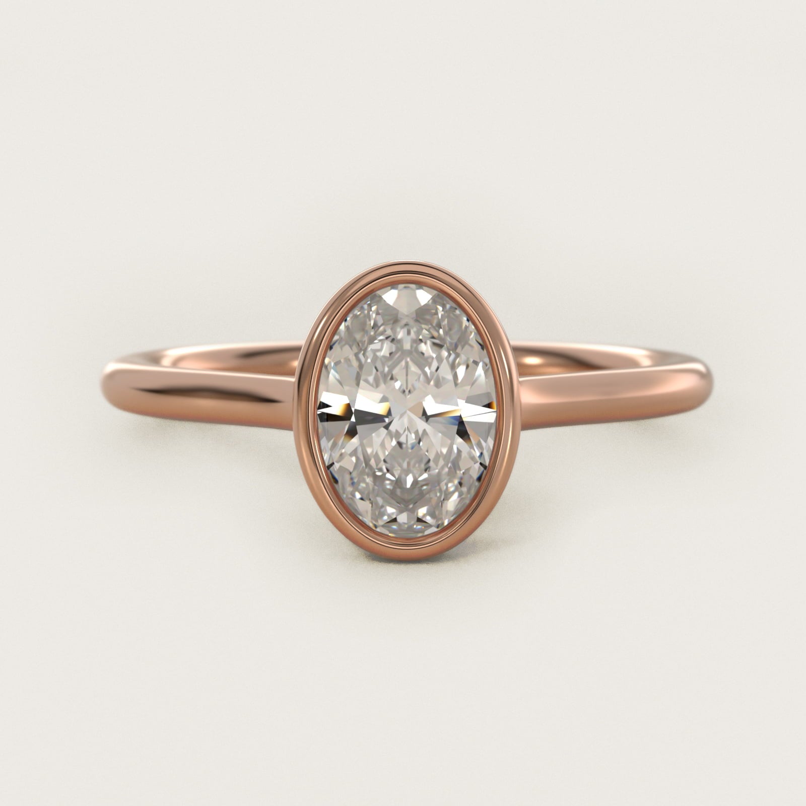 Comfort Fit Bezel Set Solitaire Engagement Ring In 14K Rose Gold By James Allen - Oval Center