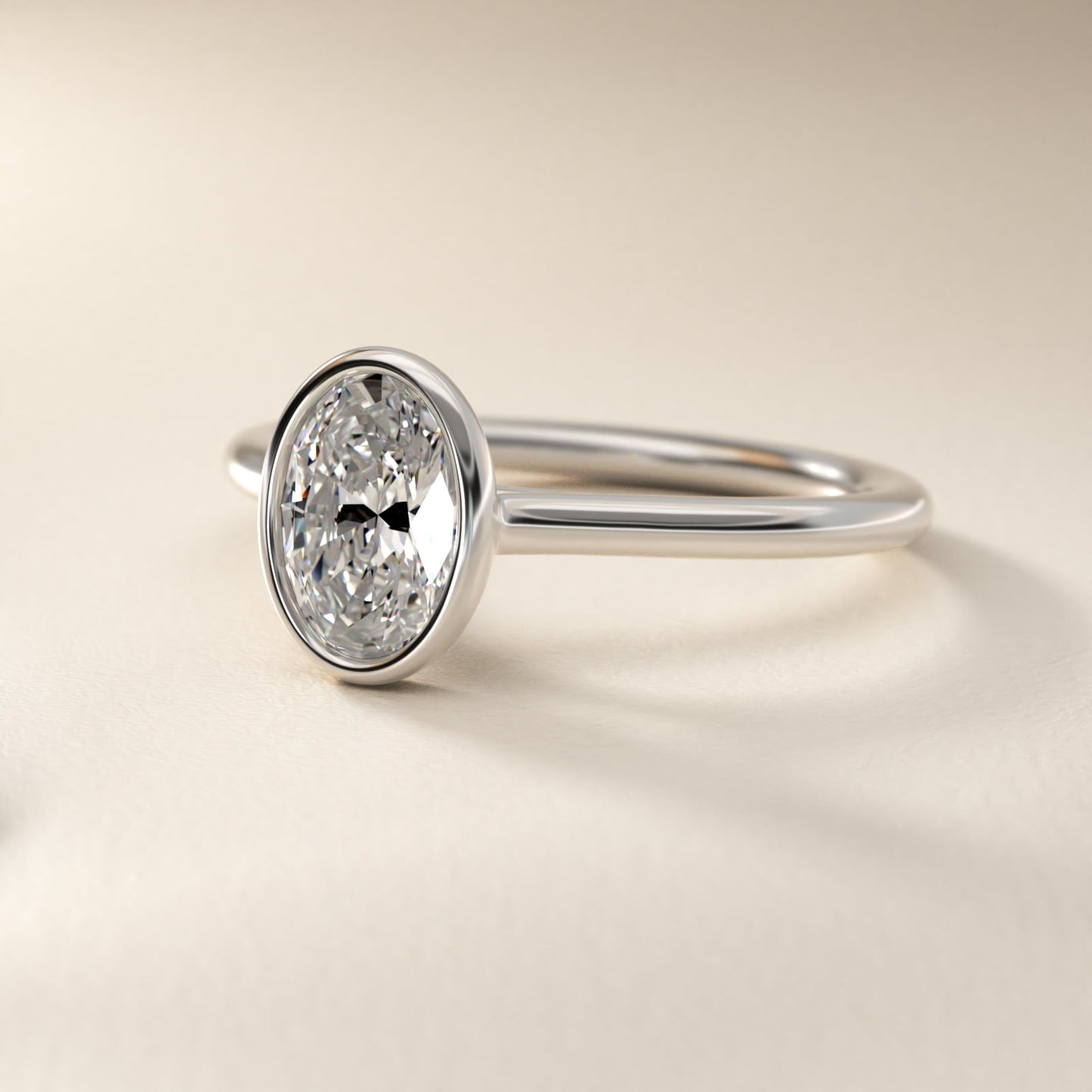 Comfort Fit Bezel Set Solitaire Engagement Ring In Platinum By James Allen - Oval Center