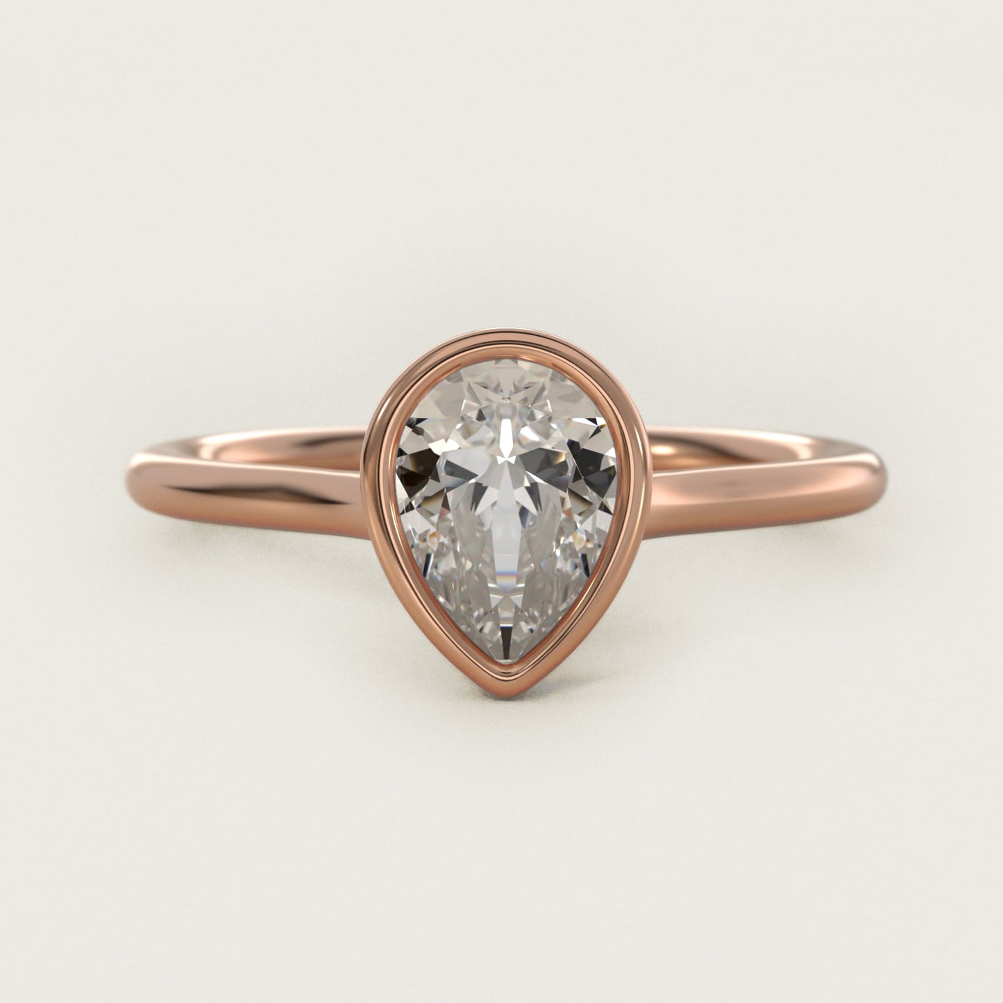 Comfort Fit Bezel Set Solitaire Engagement Ring In 14K Rose Gold By James Allen - Pear Center