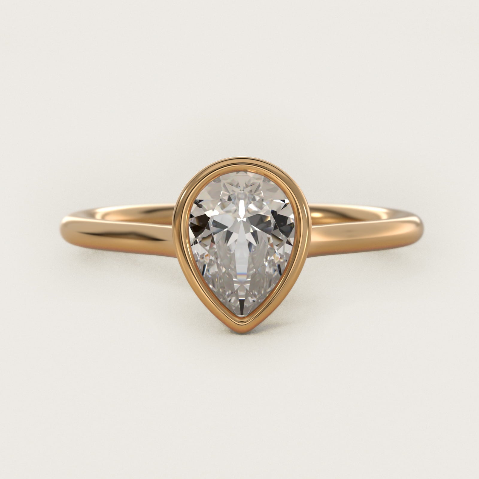 Comfort Fit Bezel Set Solitaire Engagement Ring In 14K Yellow Gold By James Allen - Pear Center
