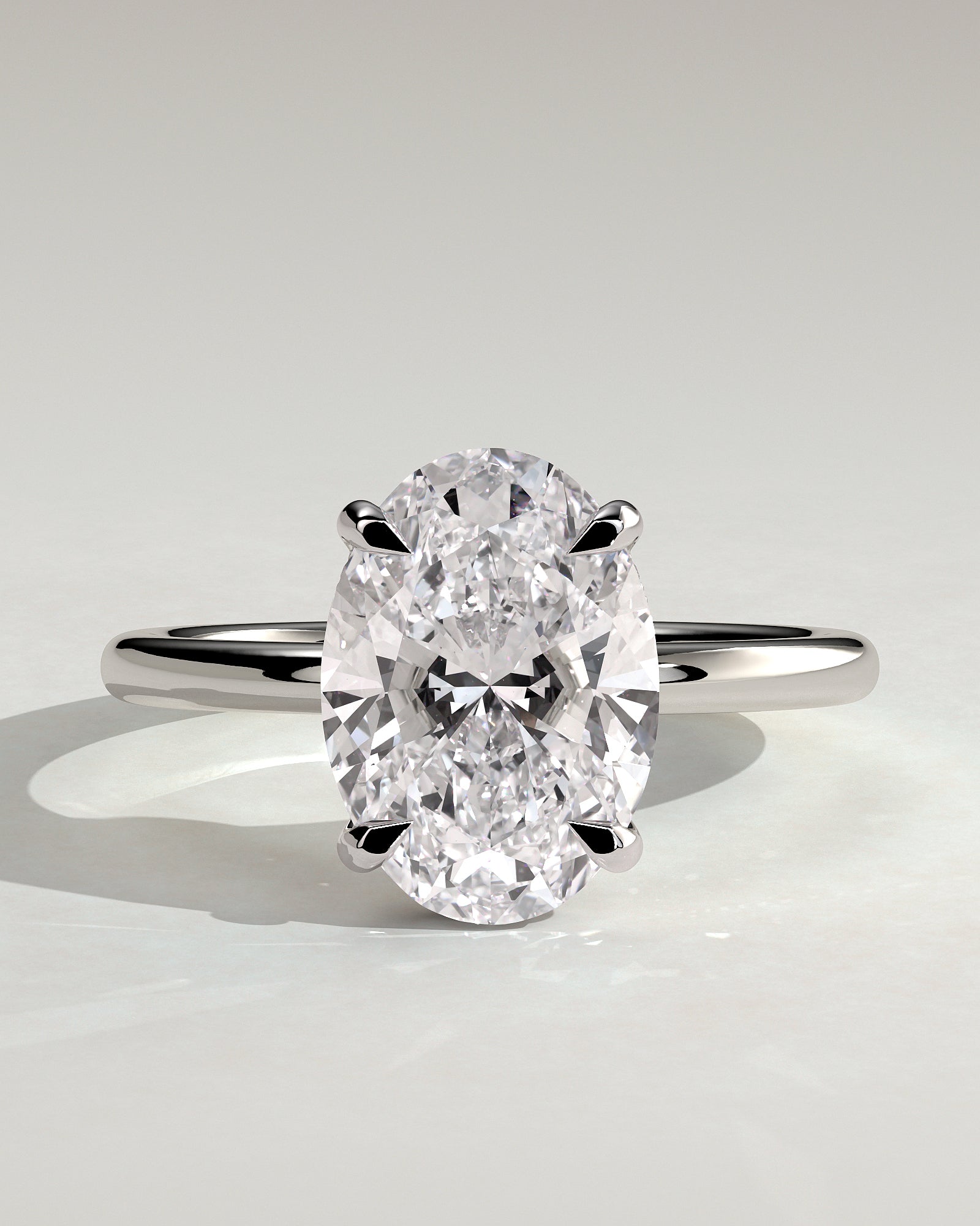 Emma - Classic Oval Claw Solitaire with Hidden Halo Engagement Ring - White Gold / Platinum - White Gold / Platinum