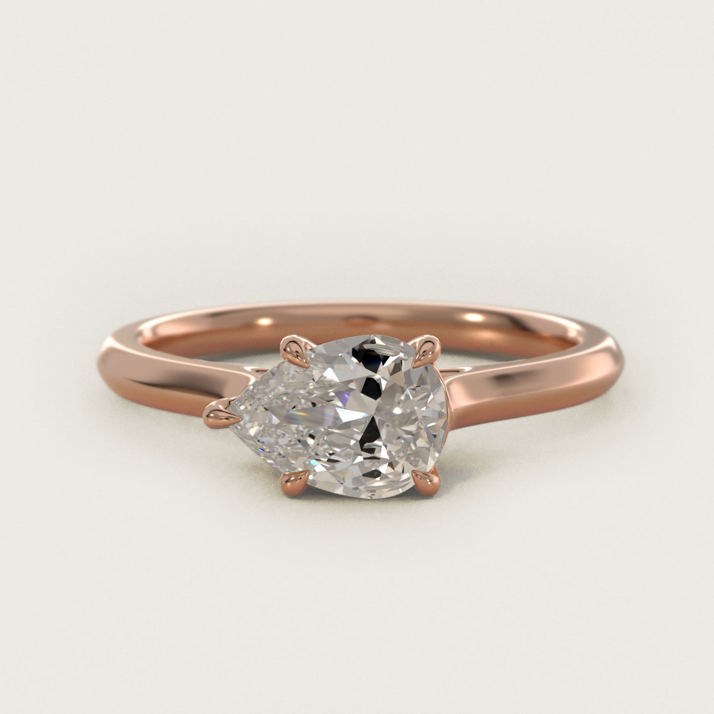 East West Solitaire in 14k Rose Gold - Pear Center