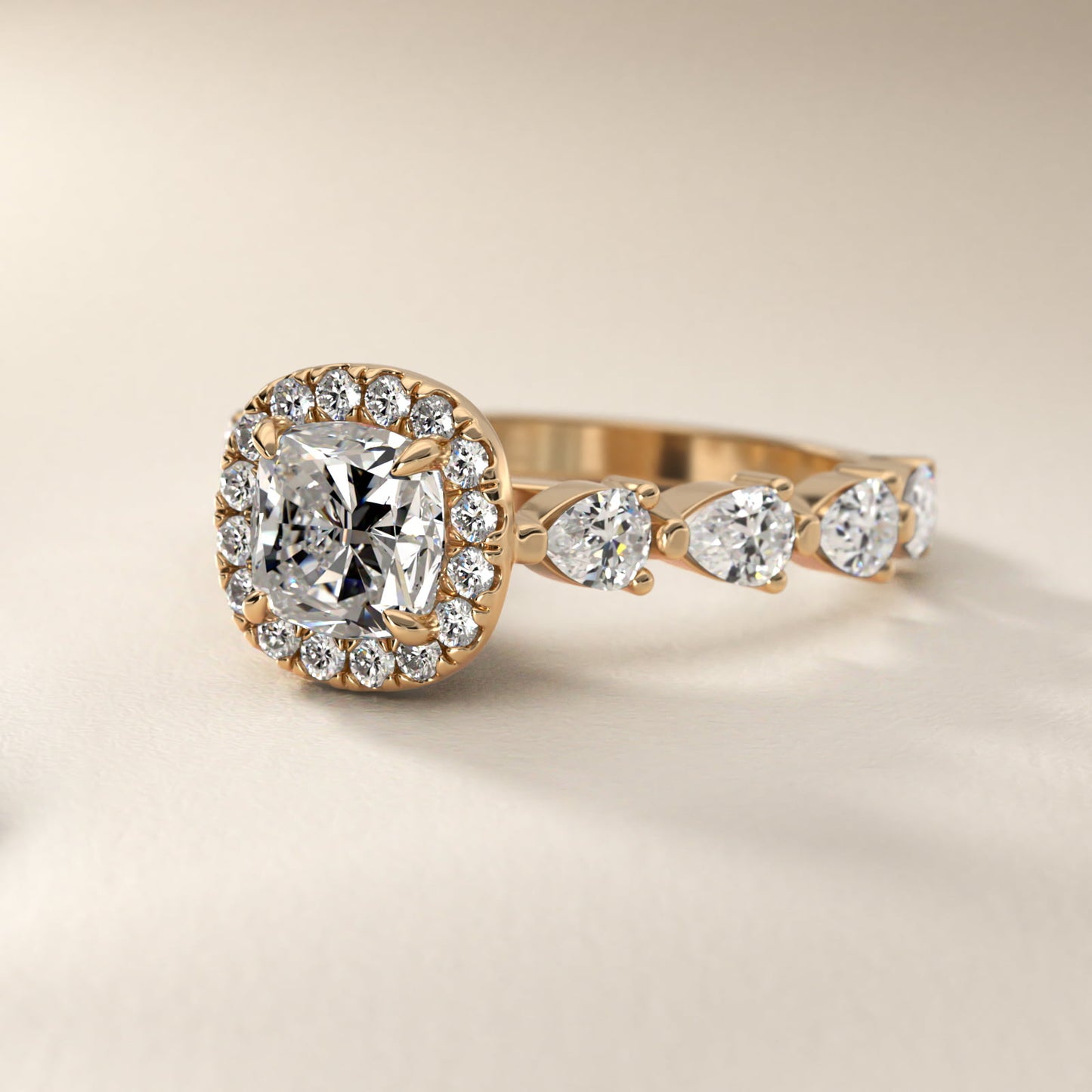 Fancy Pear Halo Engagement Ring in 14k Yellow Gold - Cushion Center