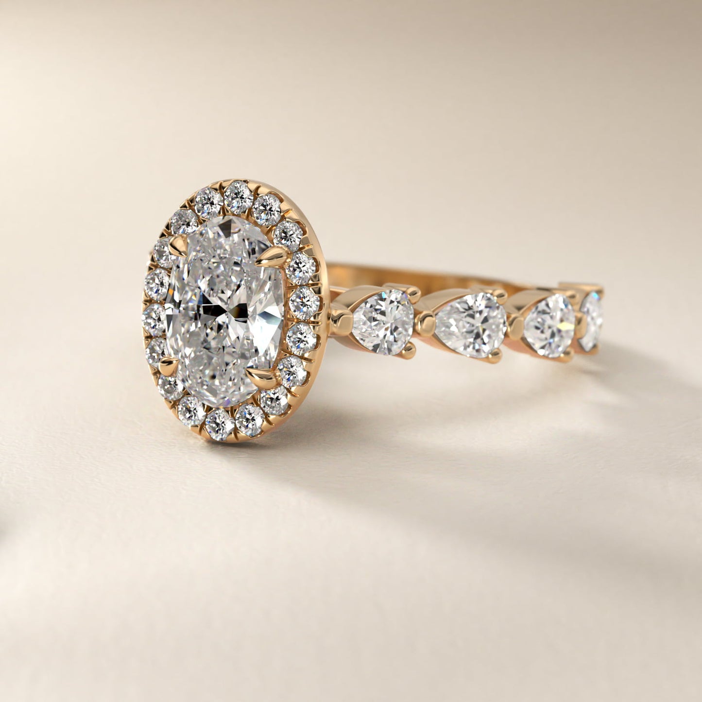 Fancy Pear Halo Engagement Ring in 14k Yellow Gold - Oval Center