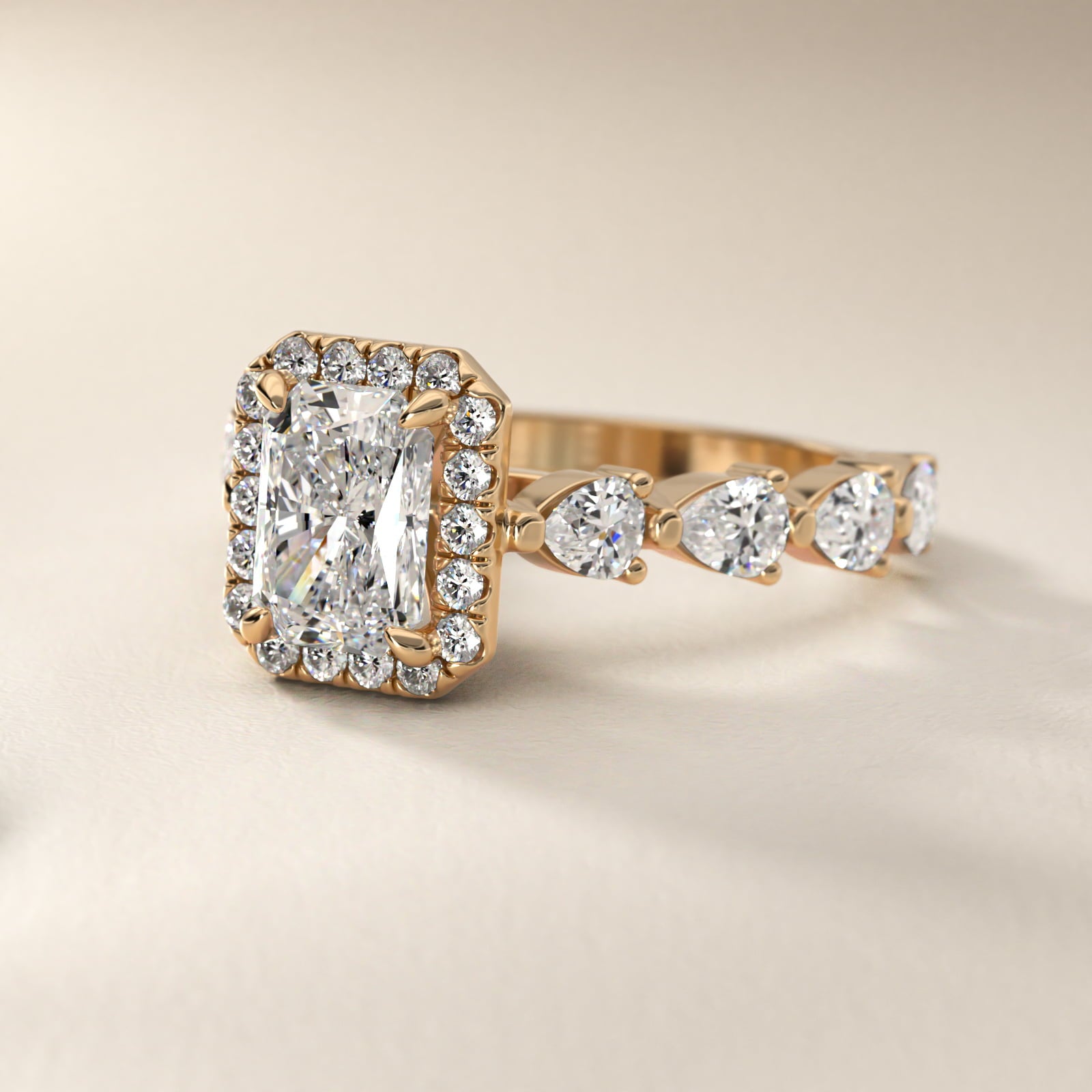 Fancy Pear Halo Engagement Ring in 14k Yellow Gold - Radiant Center