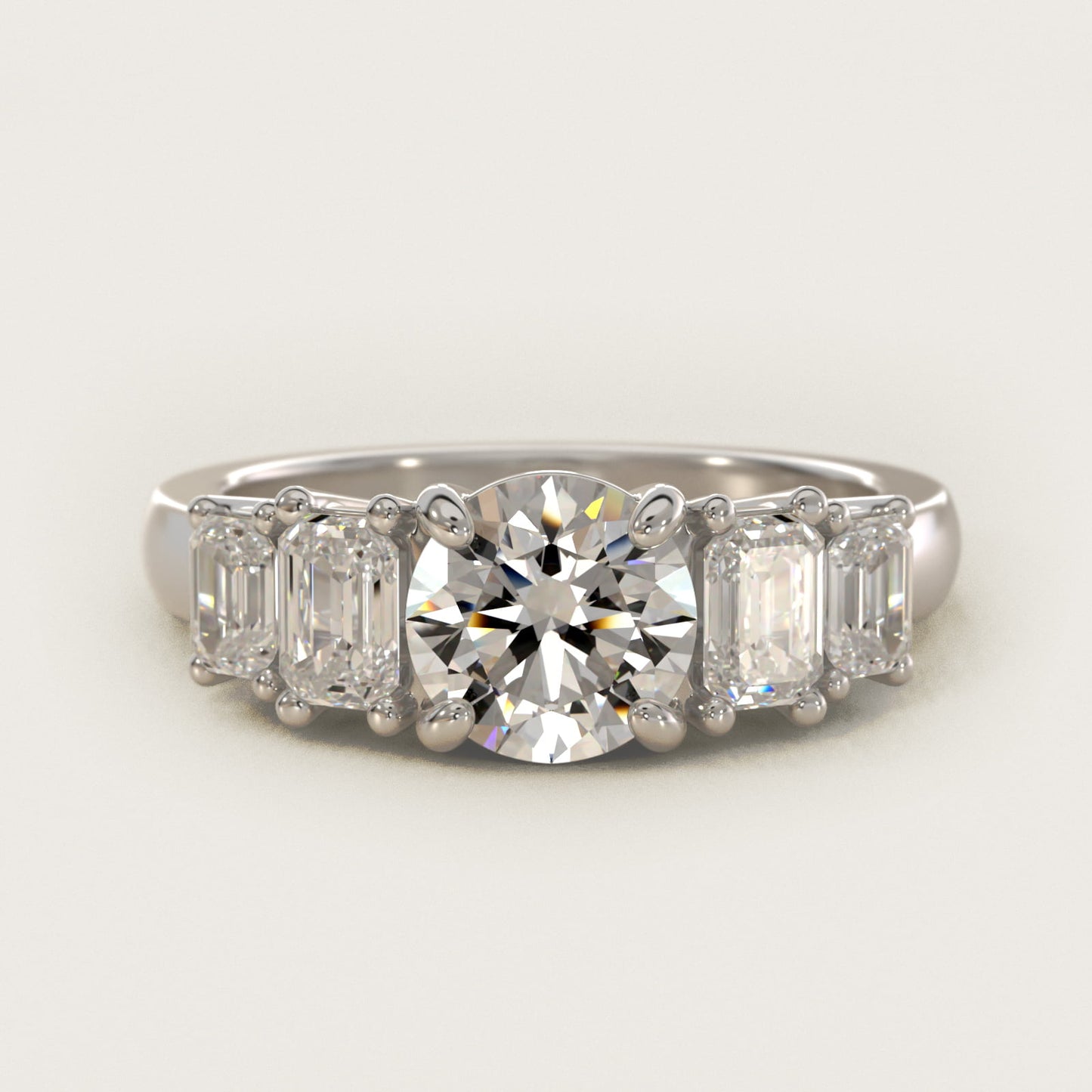 Four Stone Emerald Diamond Engagement Ring in Platinum - Round Center