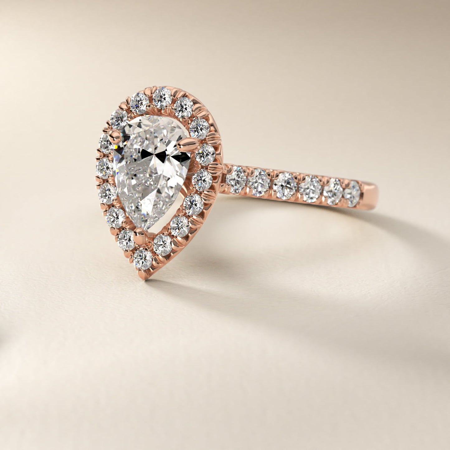 French PavŽ Diamond Halo Engagement Ring in 14k Rose Gold (1/2 ct. tw.) - Pear Center