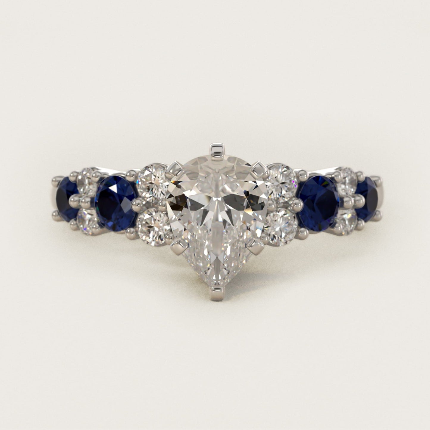 Garland Sapphire and Diamond Engagement Ring in Platinum - Pear Center