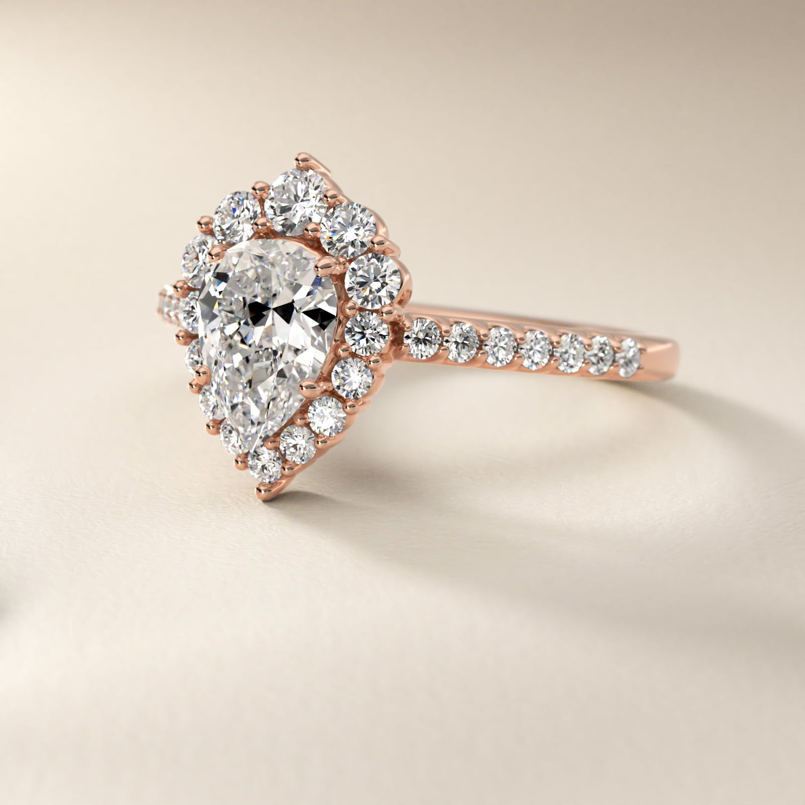 Graduated Diamond Halo Engagement Ring In 14K Rose Gold By James Allen - Pear Center