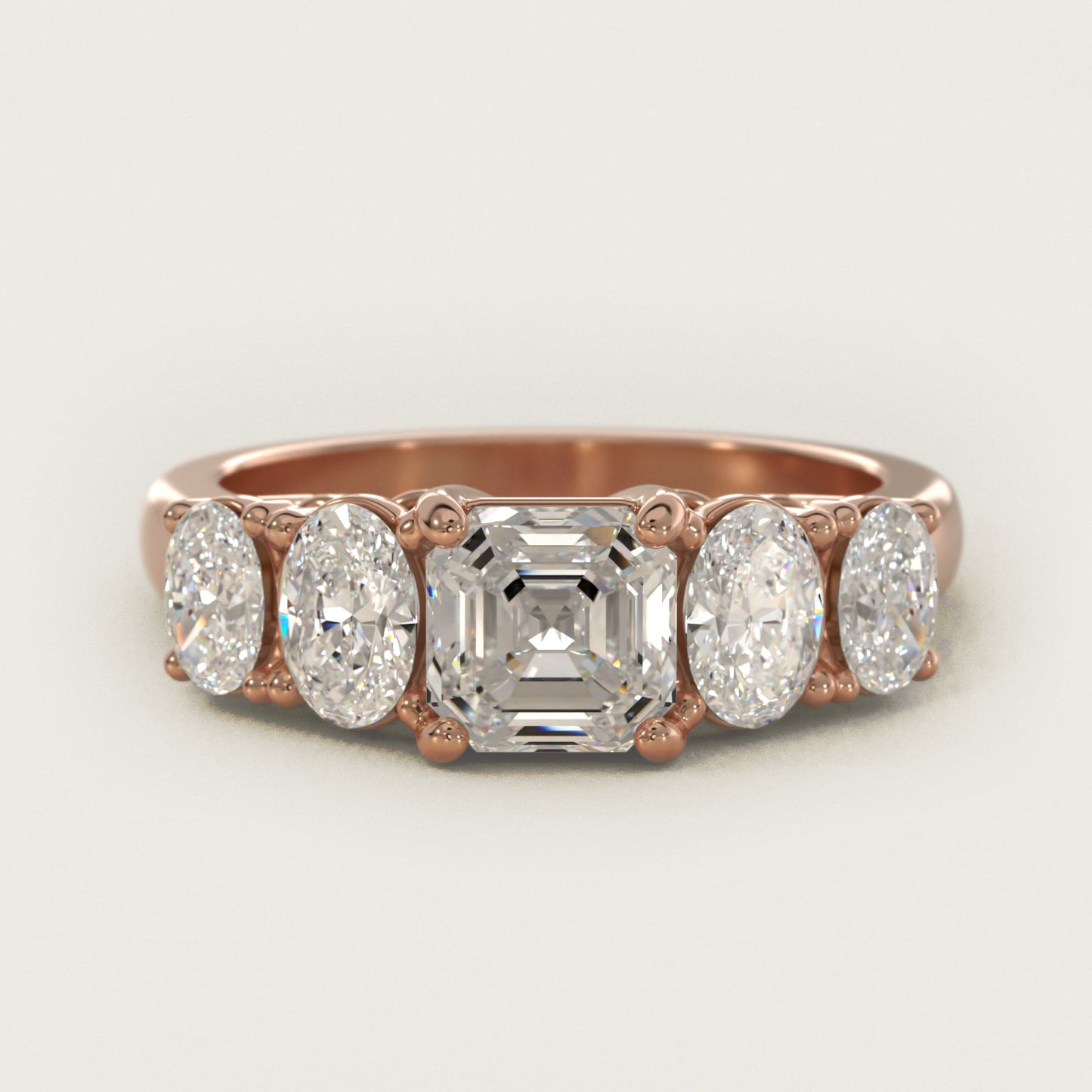 Graduated Oval Diamond Engagement Ring in 14k Rose Gold (1/2 ct. tw.) - Asscher Center