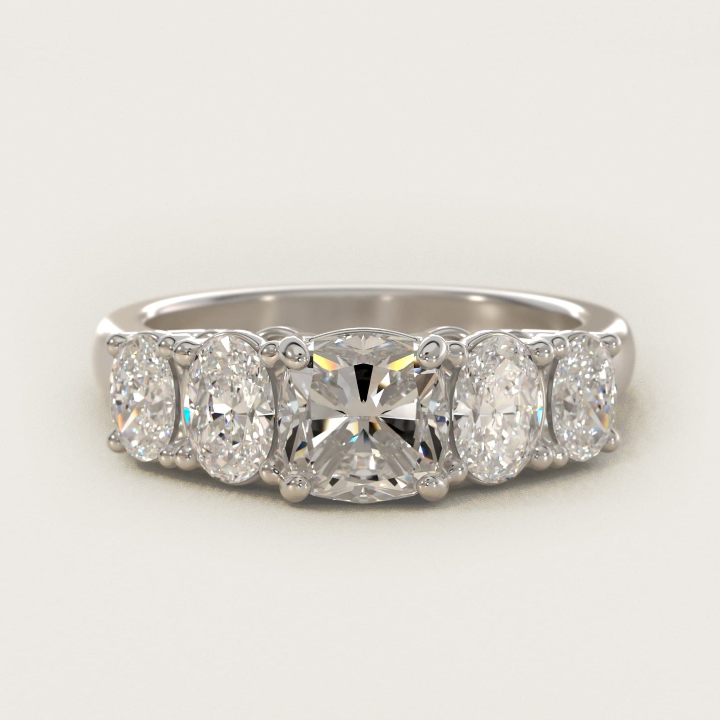 Graduated Oval Diamond Engagement Ring in 14k White Gold (1/2 ct. tw.) - Cushion Center