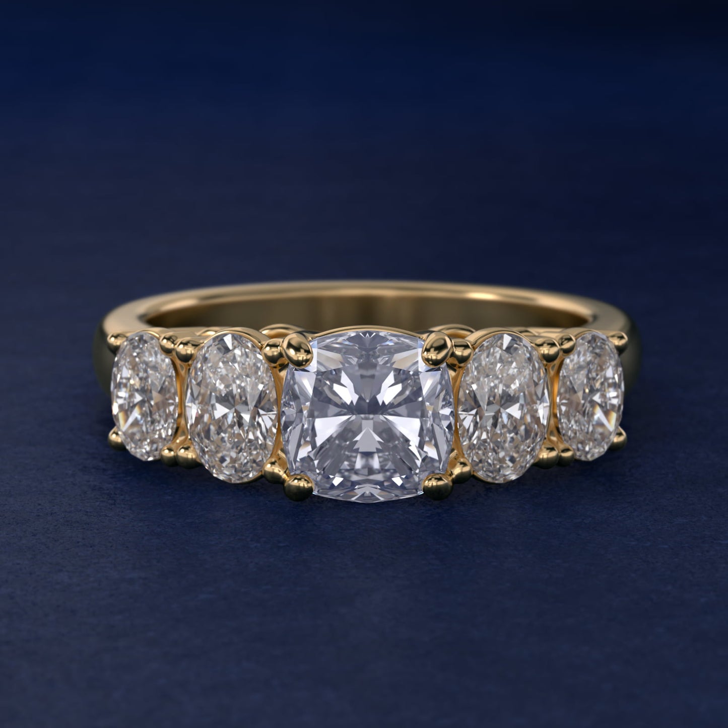 Graduated Oval Diamond Engagement Ring in 14K Yellow Gold (1/2 ct. tw.) - Cushion Center