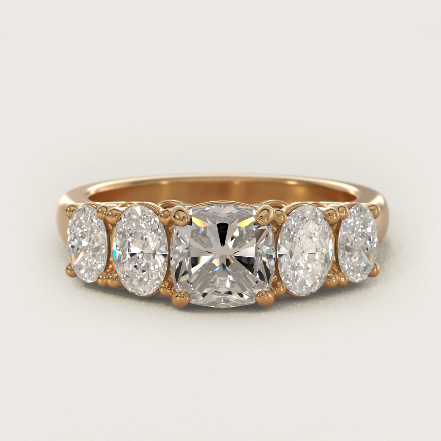 Graduated Oval Diamond Engagement Ring in 14K Yellow Gold (1/2 ct. tw.) - Cushion Center