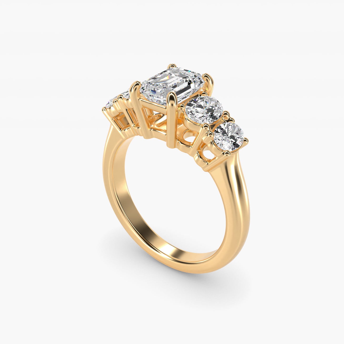 Graduated Oval Diamond Engagement Ring in 14K Yellow Gold (1/2 ct. tw.) - Emerald Center