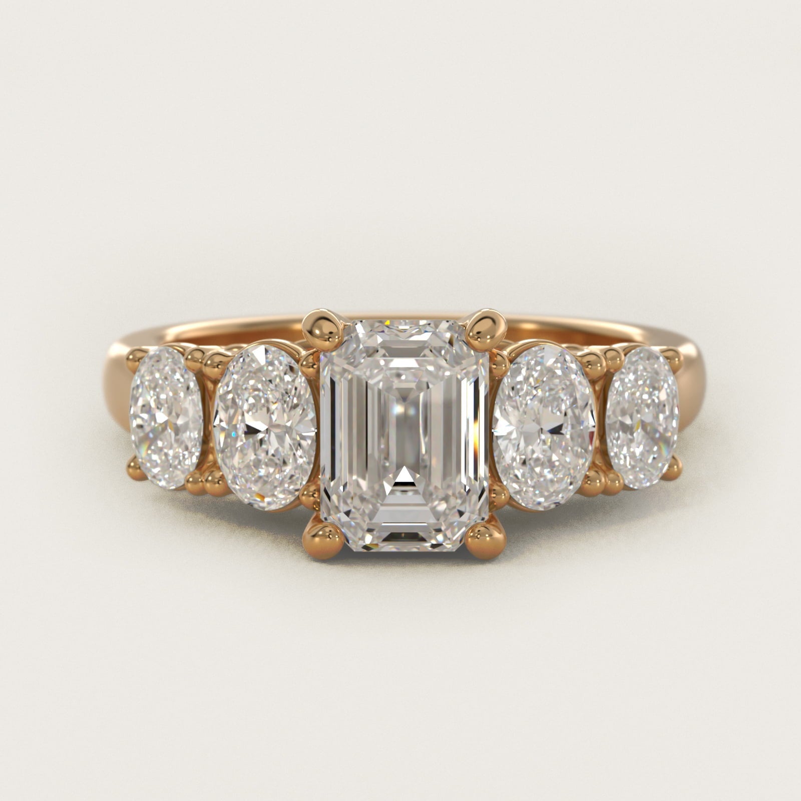 Graduated Oval Diamond Engagement Ring in 18k Yellow Gold (1/2 ct. tw.) - Emerald Center