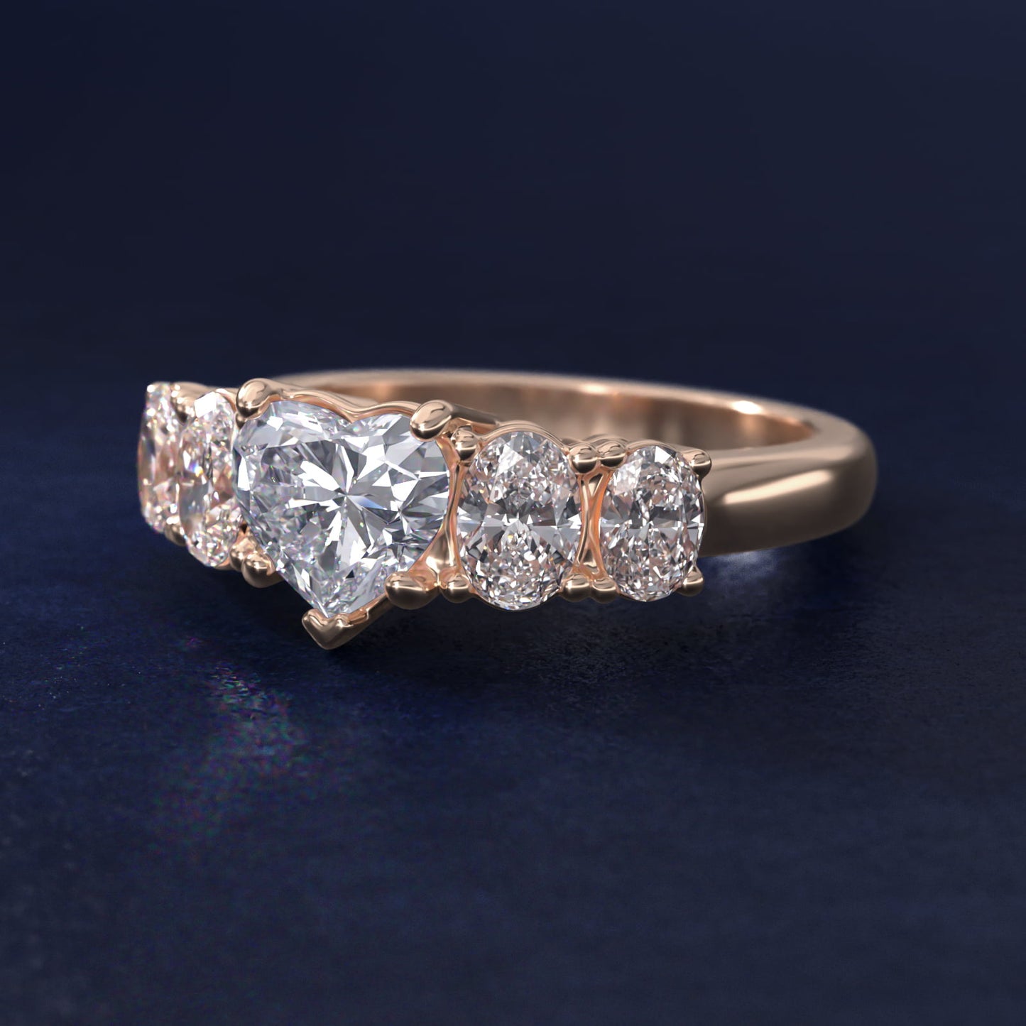 Graduated Oval Diamond Engagement Ring in 14k Rose Gold (1/2 ct. tw.) - Heart Center