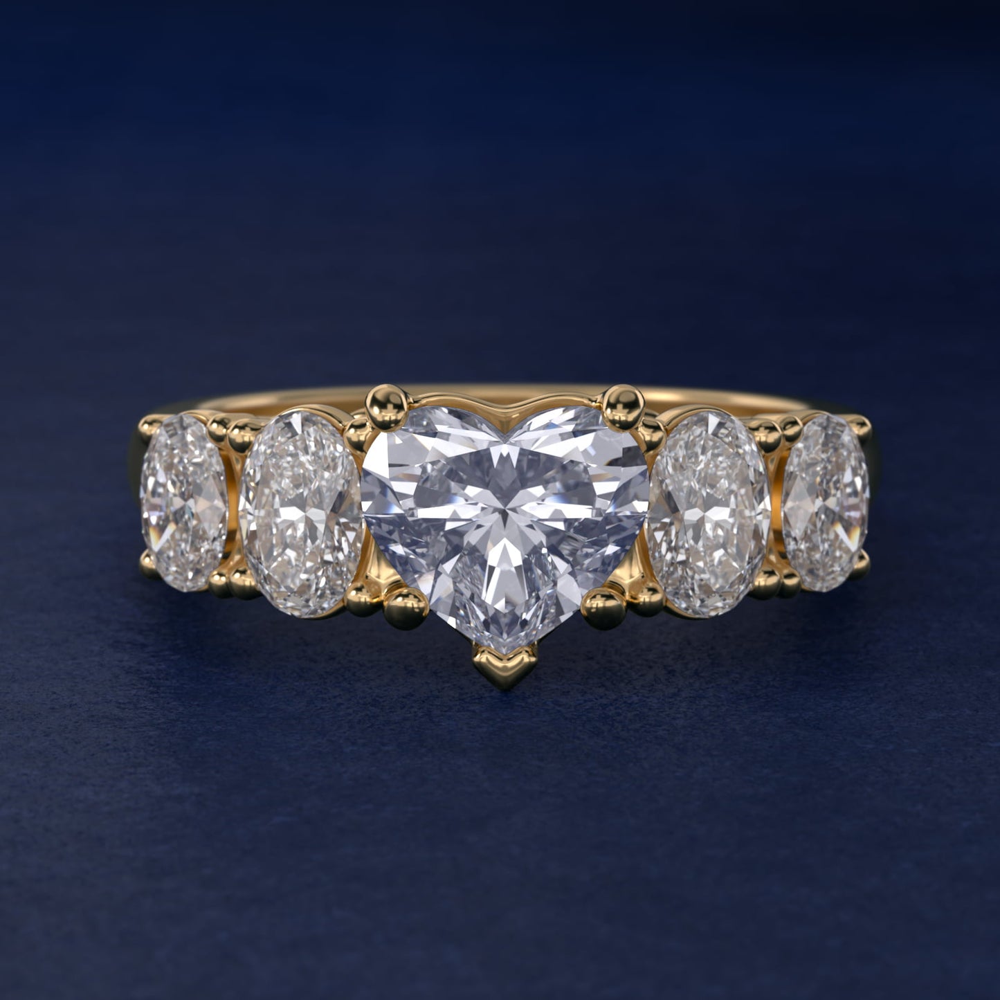 Graduated Oval Diamond Engagement Ring in 14K Yellow Gold (1/2 ct. tw.) - Heart Center
