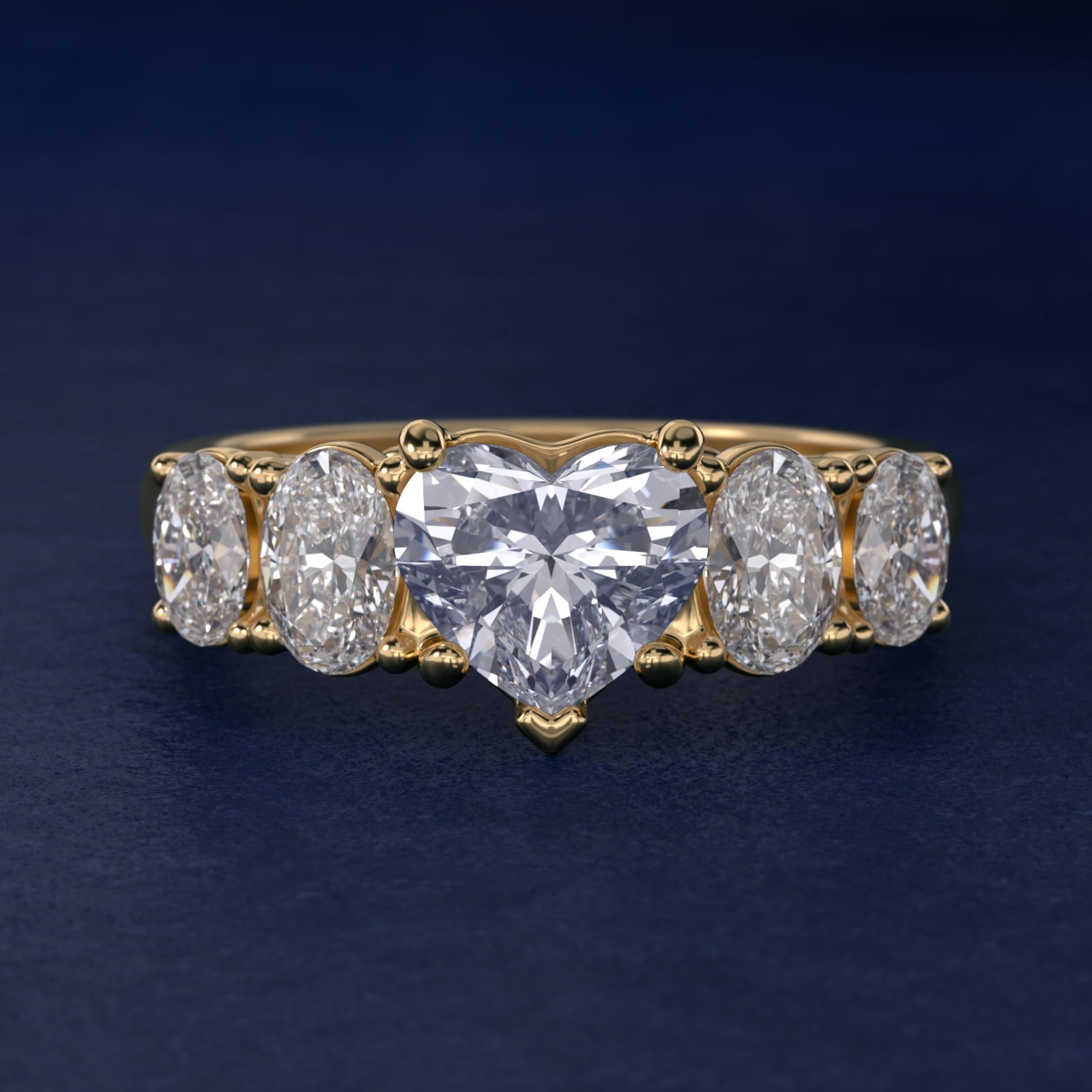 Graduated Oval Diamond Engagement Ring in 18k Yellow Gold (1/2 ct. tw.) - Heart Center